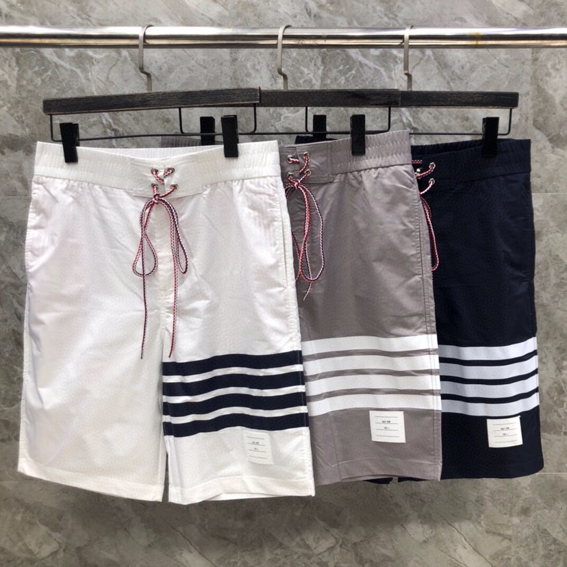 THOM BROWNE 汤姆布朗 TB四杠抽绳沙滩短裤 \n\n码数：1-4 颜色：灰、蓝、白（下单请报
