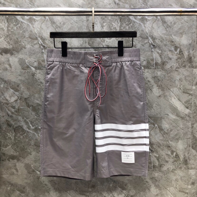 THOM BROWNE 汤姆布朗 TB四杠抽绳沙滩短裤 \n\n码数：1-4 颜色：灰、蓝、白（下单请报