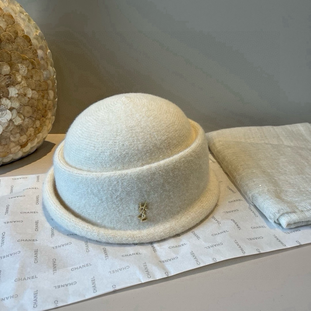 🆕

ysl圣罗兰新款羊毛卷边盆帽，不规则剪裁设计，头围57cm
