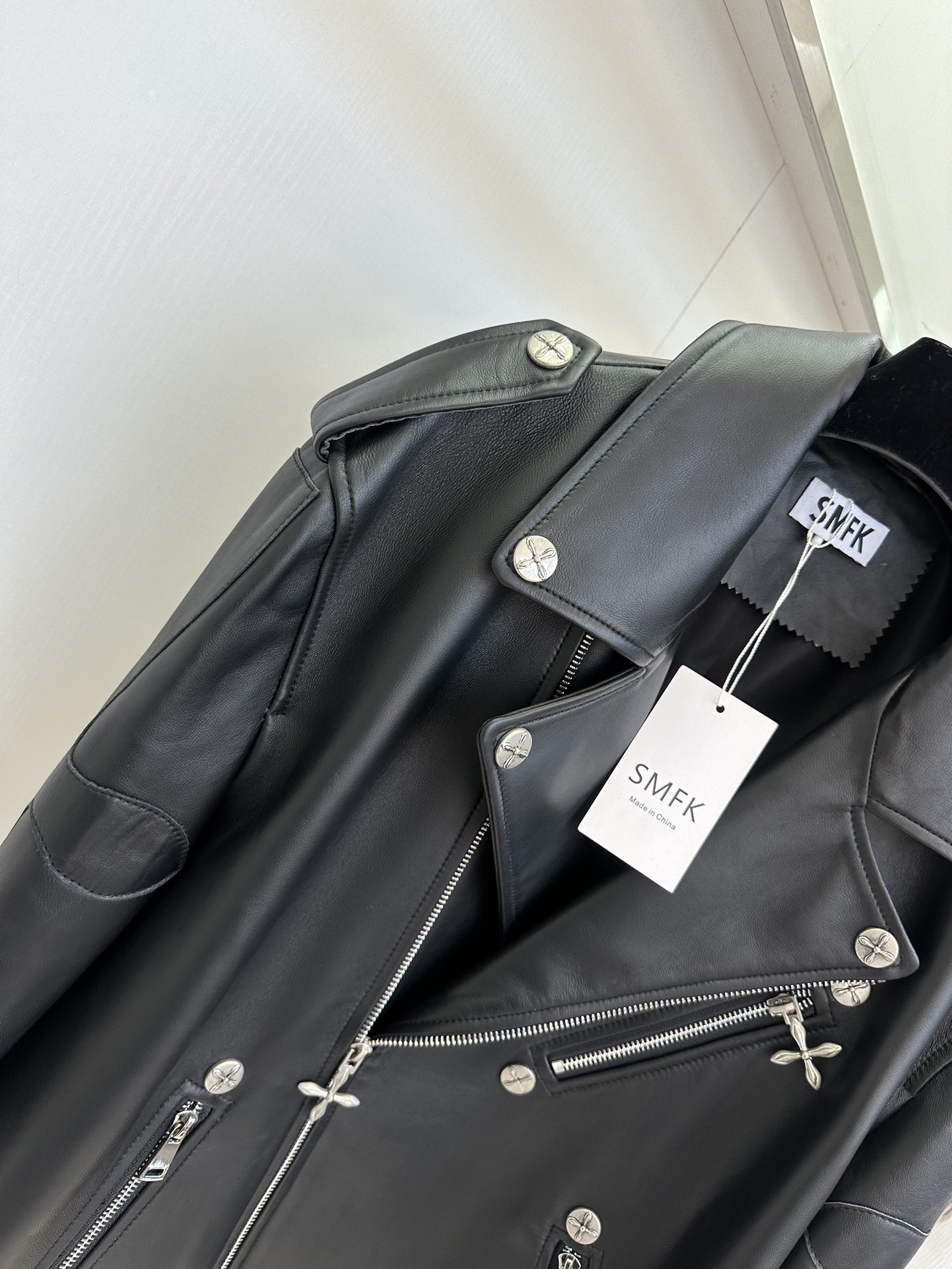 Women's Black Leather Motorcycle Jacket with White Cross Detail 7 i1757412122 1172 5