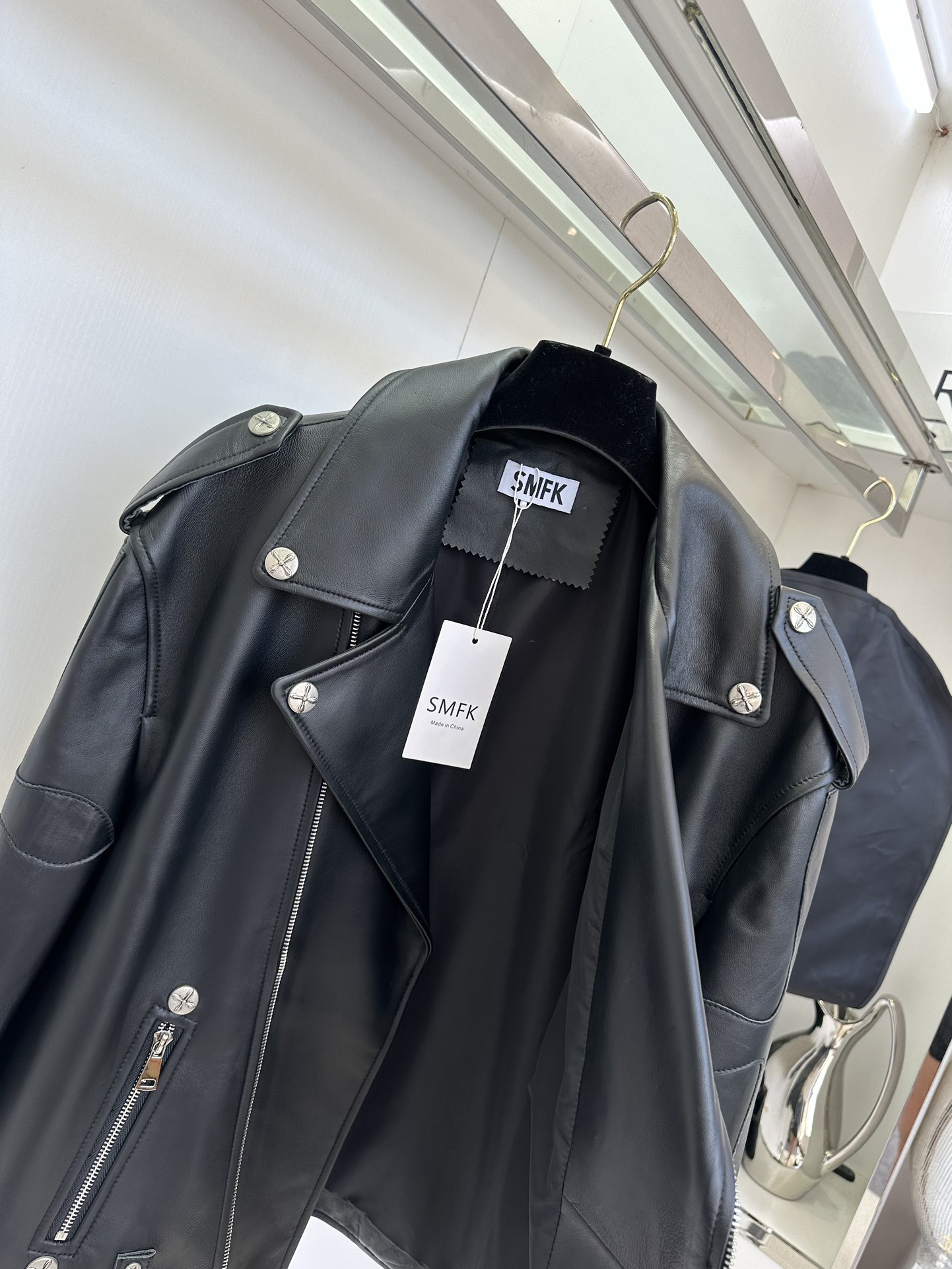 Women's Black Leather Motorcycle Jacket with White Cross Detail 9 i1757412122 9037 7