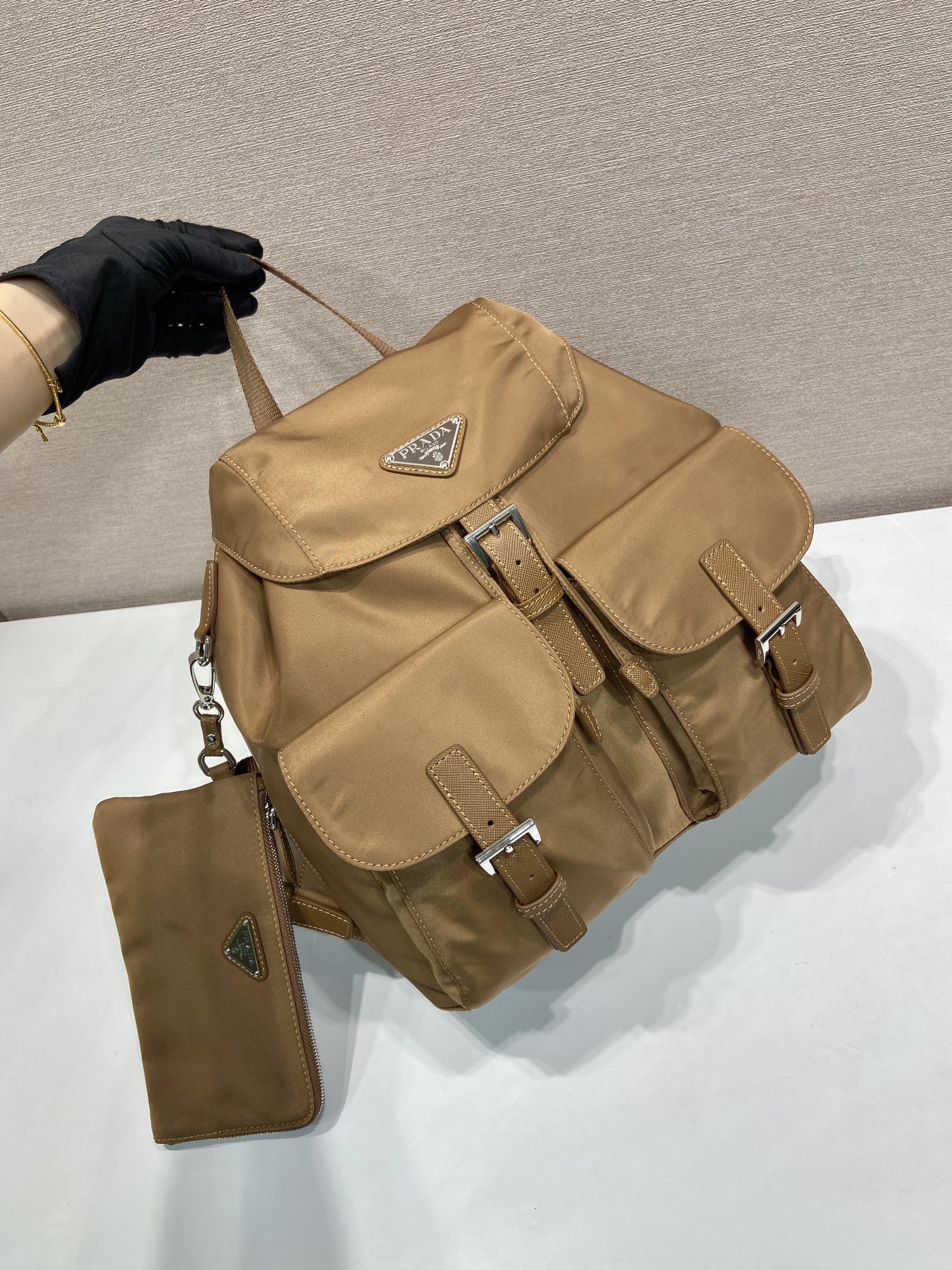 PRADA リボン付き レディース バックパック ナイロン×サフィアーノレザー 軽量 三角ロゴ 30×32×15cm
