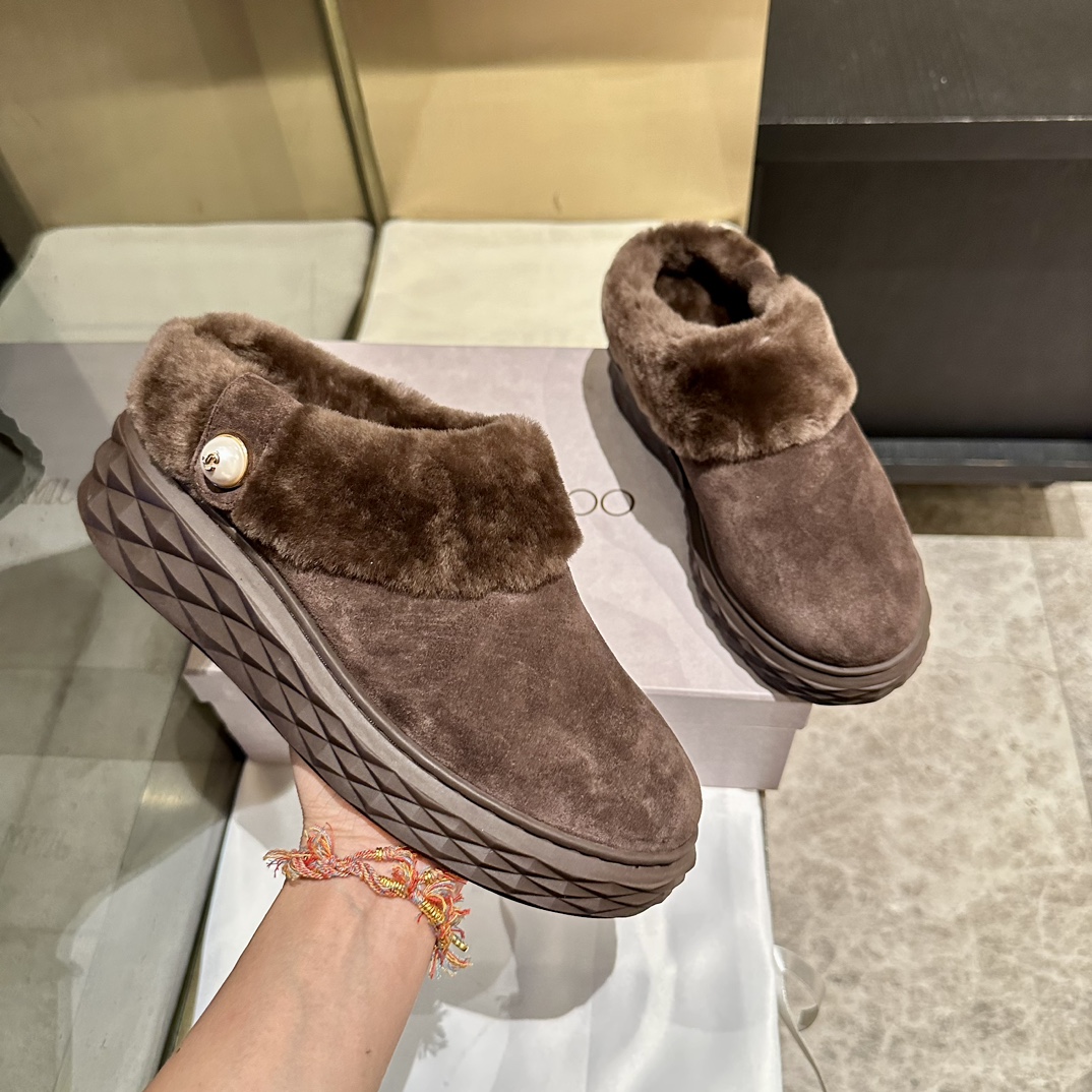 Jimmy Choo Shearling-Lined Suede Clogs: Warm, Stylish, and Uniquely Crafted