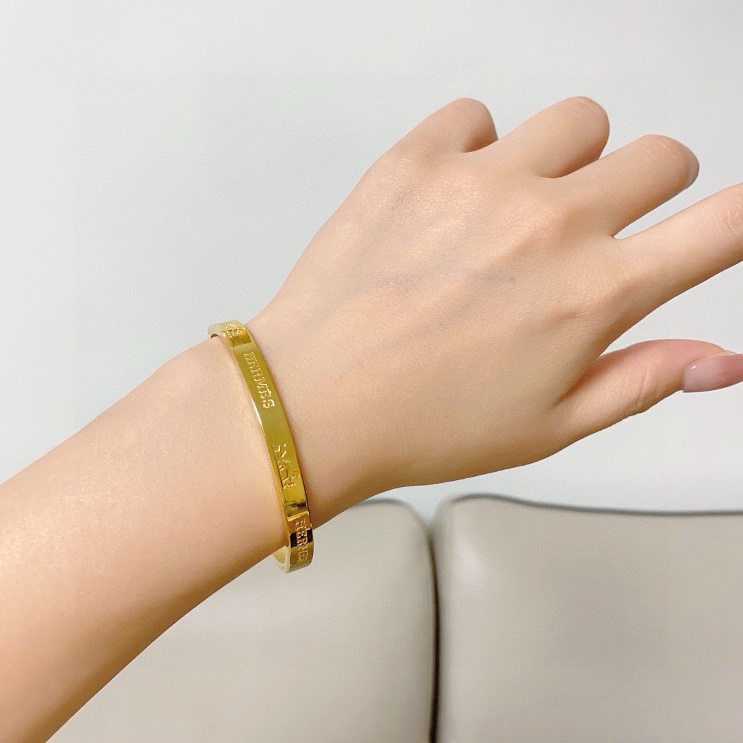 Hermes 14K MM bracelet Gold-tone metal Silver-tone metal Rose