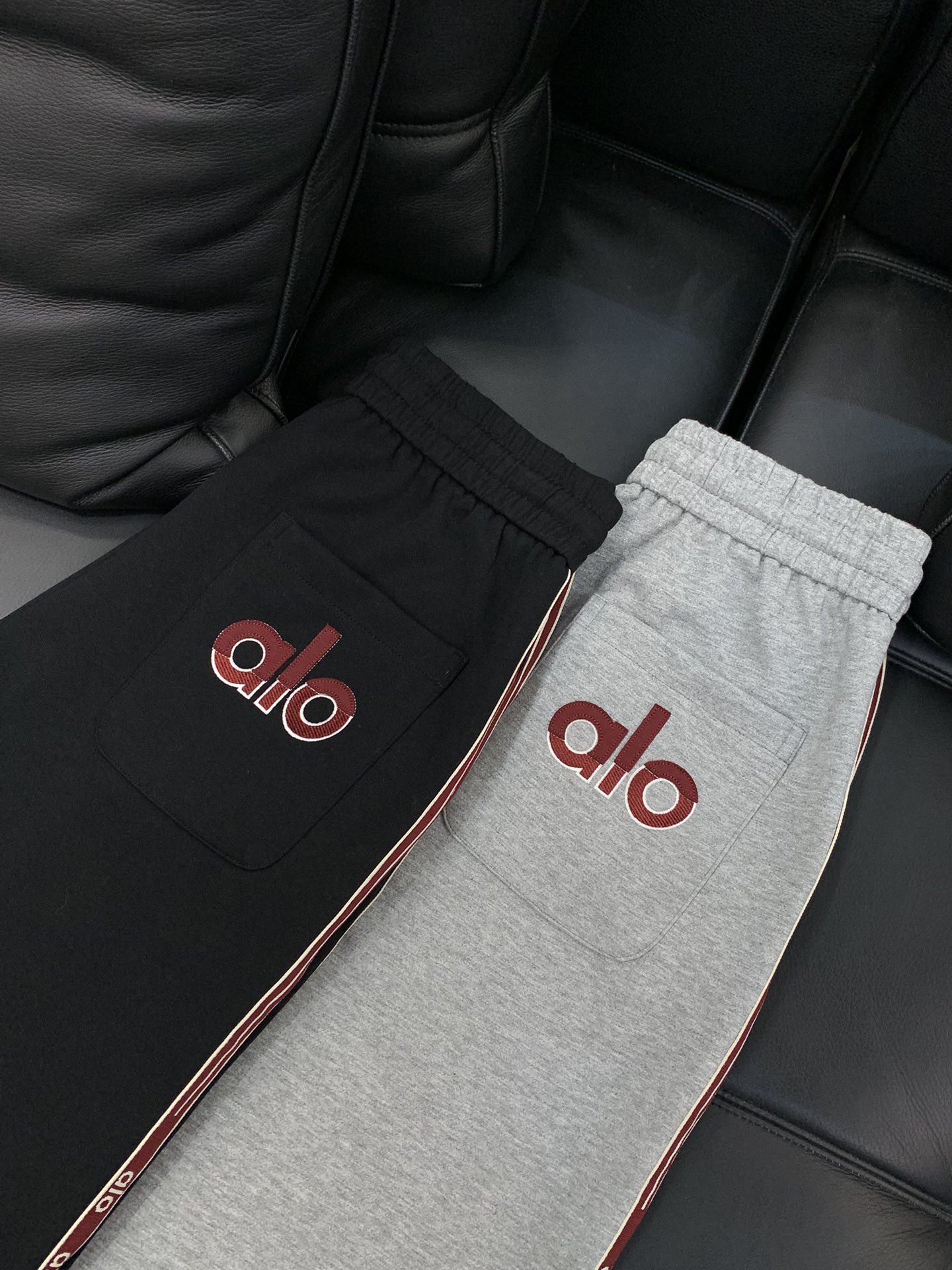 ，ALO灰色直筒休闲裤材质 面料:棉32%锦纶63%氨纶5%里料:涤纶100%机洗，手洗最高水温30℃ 