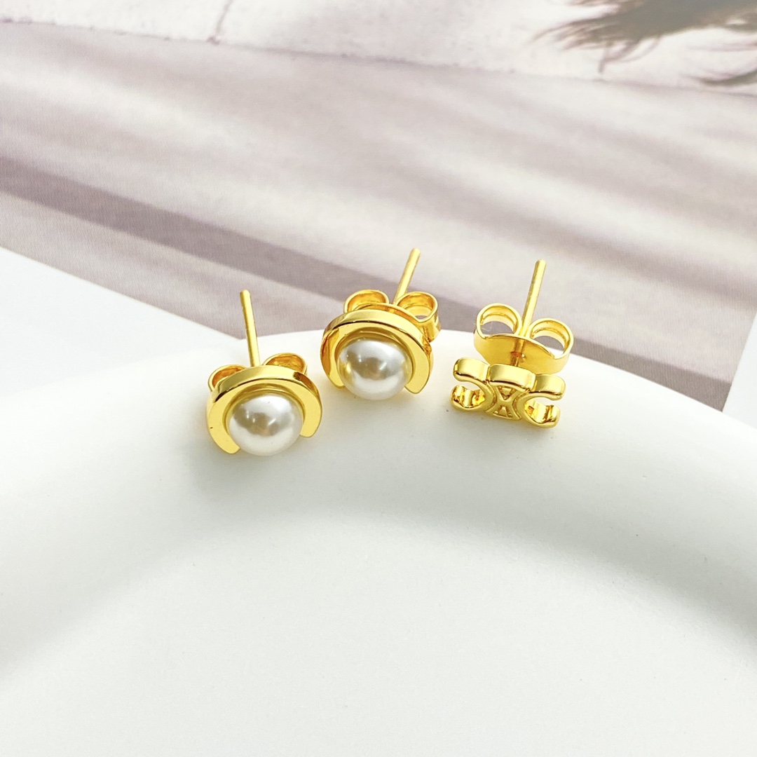 Celine Triomphe Pearl Stud Earrings earrings Gold-tone metal with white pearl accents One Size standard stud post length