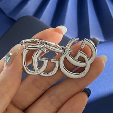 GQ80 古驰GUCCI简约大气经典双G字母光面设计耳环 黄铜材质 金色银色 重约24.25g 约长3. GQ80 古驰GUCCI简约大气经典双G字母光面设计耳环 黄铜材质 金色银色 重约24.25g 约长3.