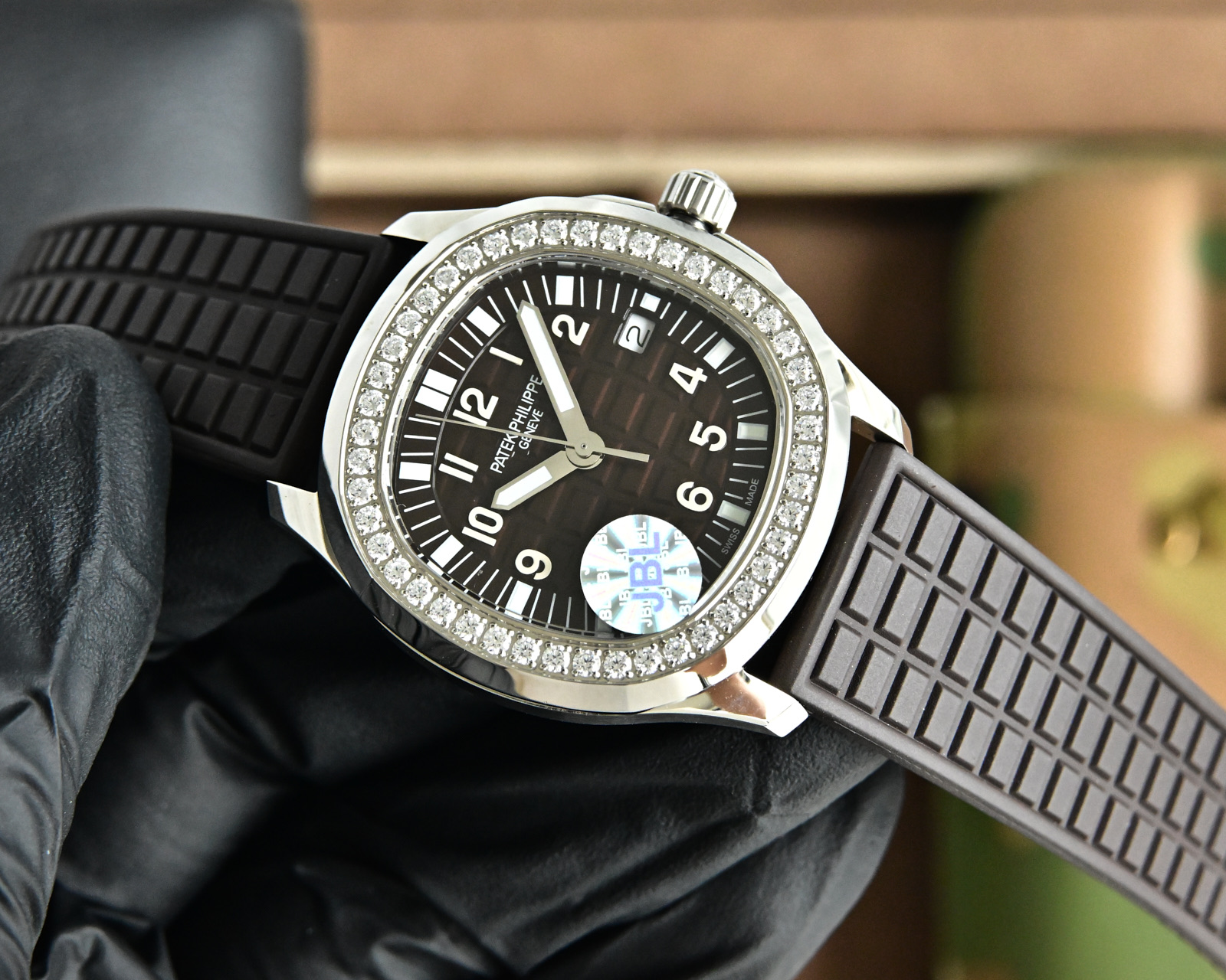 Patek Philippe Aquanaut Luce 5067A stainless steel case, diamond bezel, dark brown dial, brown rubber strap 35.6mm Women's Quartz