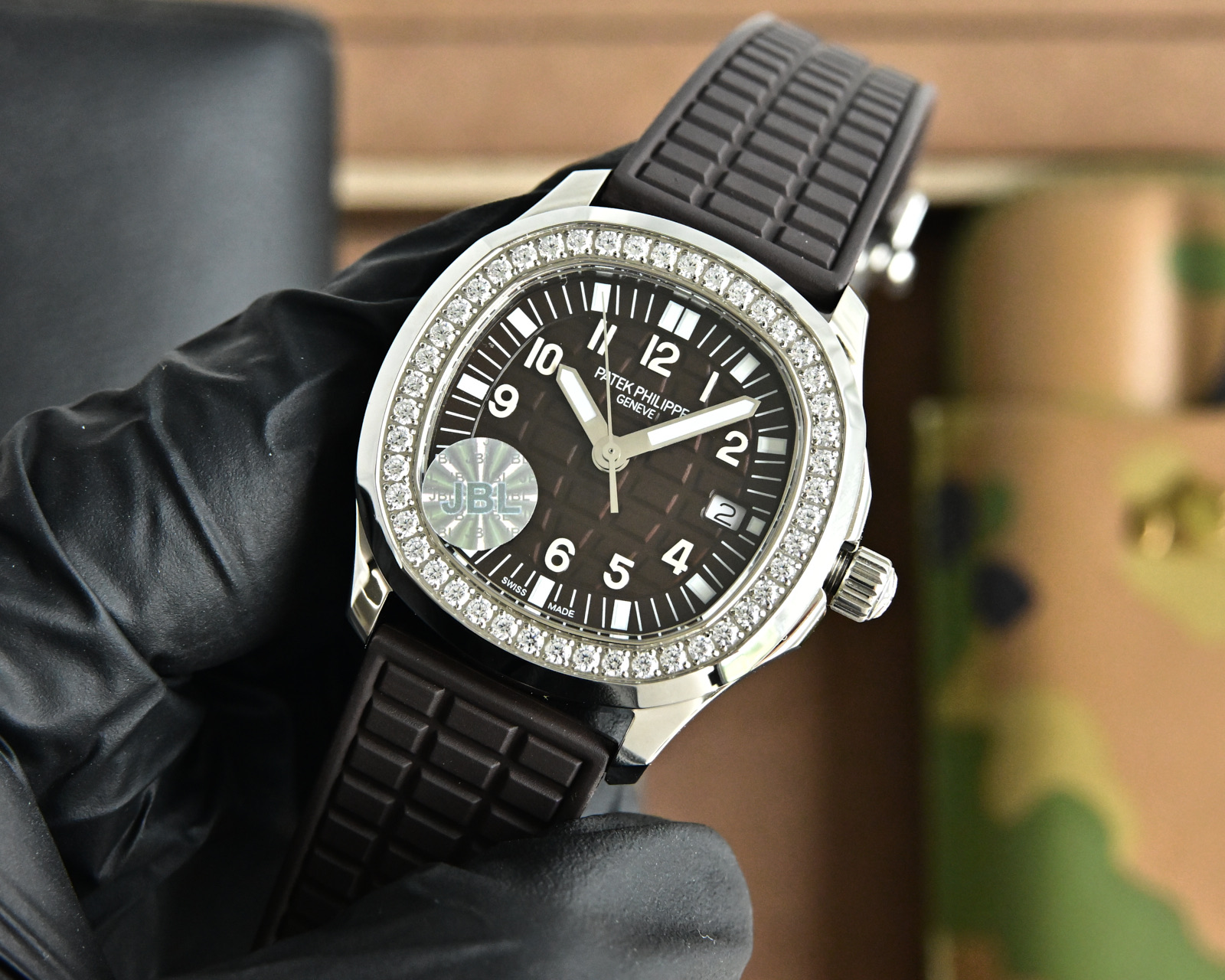 Patek Philippe Aquanaut Luce 5067A stainless steel case, diamond bezel, dark brown dial, brown rubber strap 35.6mm Women's Quartz