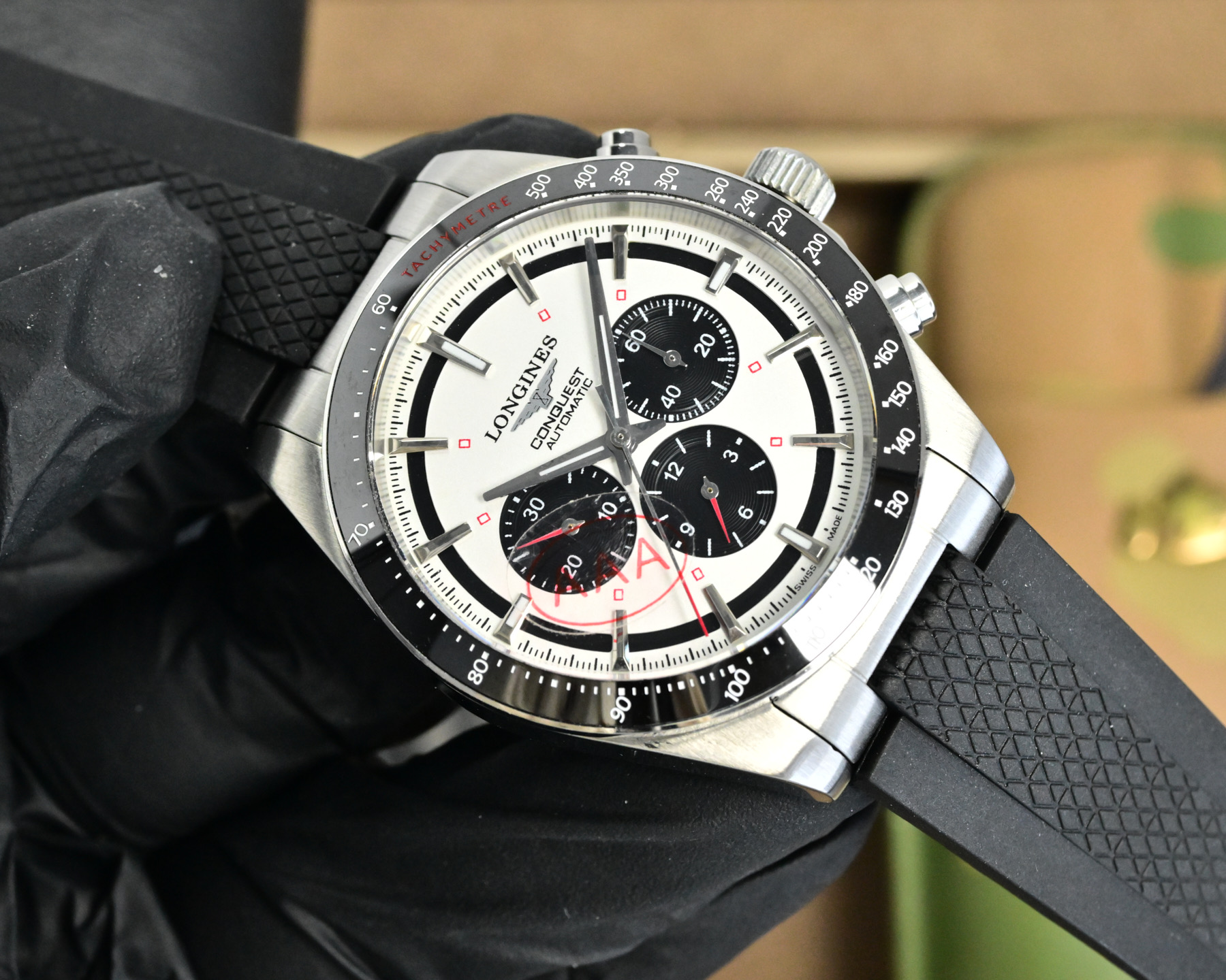 Longines Conquest Chronograph Automatic silver case, black bezel, white dial, black rubber strap 41mm Men's Automatic