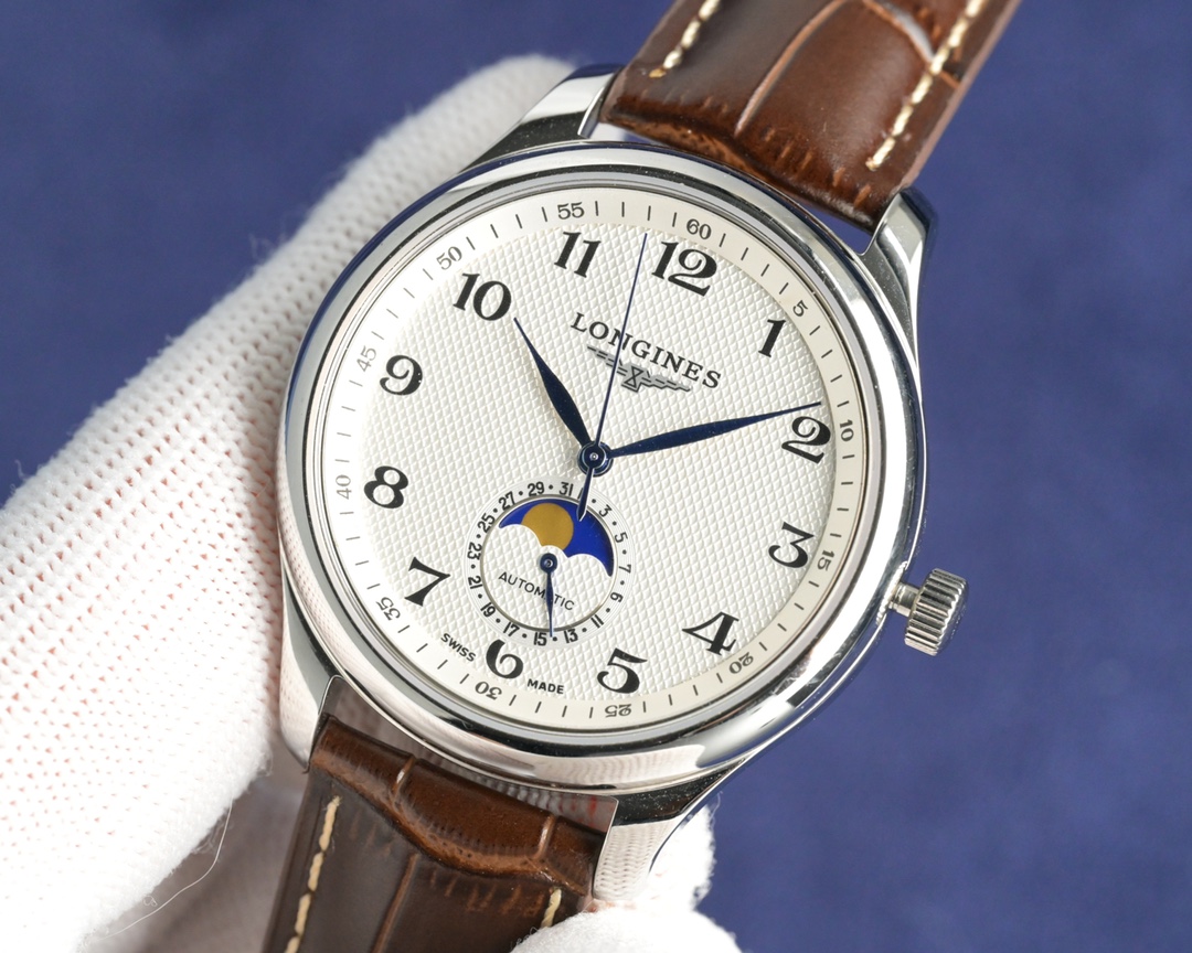 NO:393996,Longines LONGINES famous smith (white shell) 41mm automatic mechanical series movement type three-pin half-moon phase automatic mechanical case material stainless steel, thickness 11.8mm dial material 316 stainless steel watch mirror material wear-resistant synthetic sapphire strap material stainless steel belt, black belt, brown belt. buckle material stainless steel, butterfly buckle waterproof performance 30 meters function moon phase 24 hours rotation. During the day, sun, moon and stars at night., longines19860909浪琴LONGINES名匠（白壳） 41mm自动机械系列 机芯类型三针半月相自动机械 表壳材质精钢,厚度11.8mm 表盘材质316精钢 表镜材质抗磨损合成蓝宝石 表带材质精钢钢带、黑色皮带、棕色皮带. 表扣材质精钢、蝴蝶表扣 防水性能30米 功能月相24小时转.白天太阳,夜晚月亮星星.,,longines,Watch