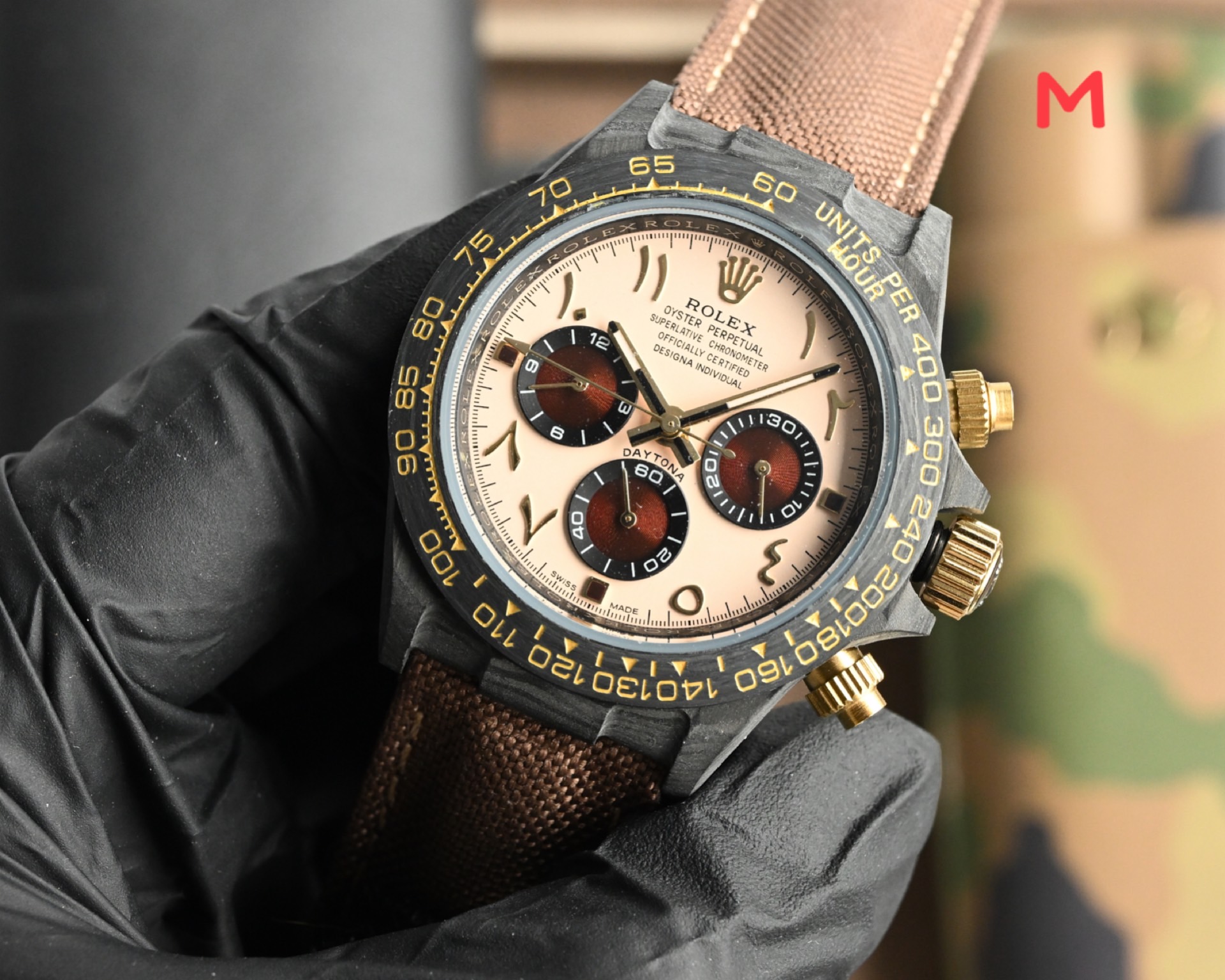 Rolex Cosmograph Daytona black bezel, champagne dial, gold accents, brown strap 40mm Men's Automatic