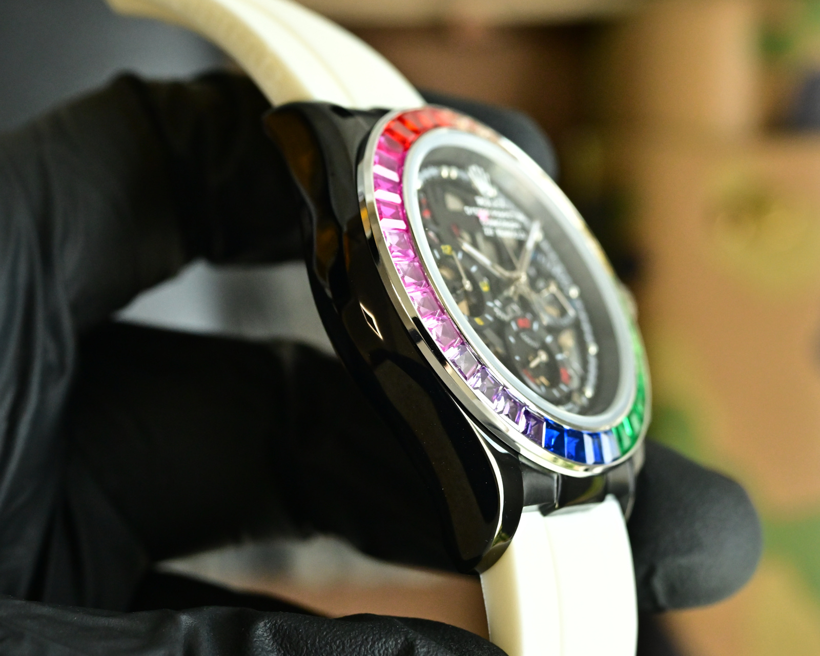 Rolex Daytona Rainbow Skeleton black case, rainbow gemstone bezel, black skeleton dial, white rubber strap 43mm Men's Automatic