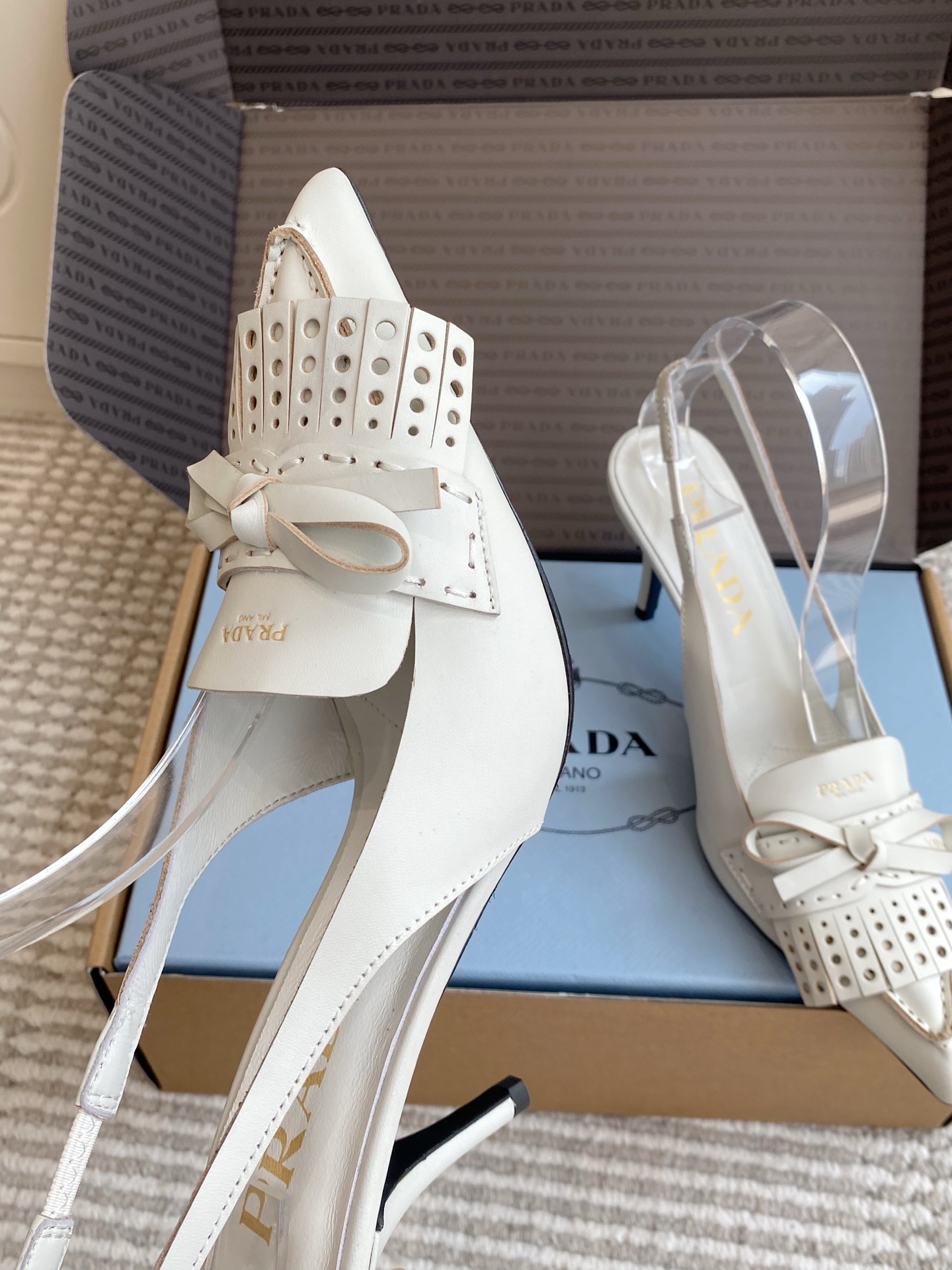 Prada  Fringe Bow Pointed-Toe Slingback Heels 