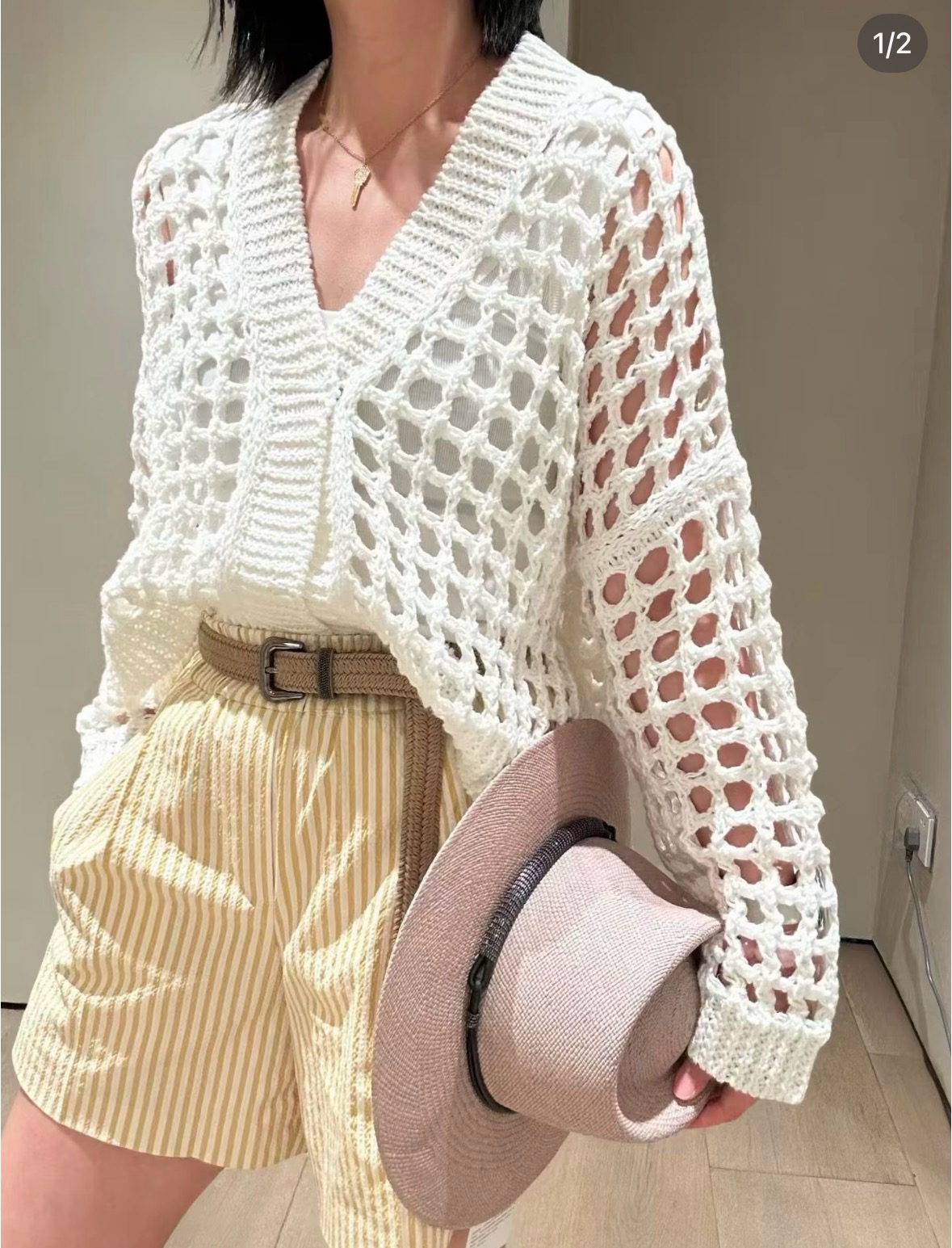 NO:911355,26 spring and summer new products  BC pure white mesh knitted cardigan, a refreshing and healing high-end milky white tone. The large three-dimensional hollow weave is light and breathable, the roving texture is full of hand-made warmth, and the short version is neat and proportional. The simple V-neck softens the skin, the loose long sleeves accommodate the body shape, and the buttonless design is simple and casual. It is highly suitable for spring and summer with suspenders and wide-leg pants. It is elegant and clean without unnecessary decoration, showing a low-key, gentle, calm and comfortable light luxury outfit. Ready in stock smL,,1986090926春夏新品 BC纯白网眼针织开衫,清爽治愈的高级奶白调.立体大镂空织法轻盈透气,粗纱肌理富有手工温度,短款版型利落显比例.简约V领柔和衬肤,宽松长袖包容身形,无扣设计简约随性.春夏搭配吊带、阔腿裤适配度极高,素雅干净无多余装饰,尽显低调温润、从容自在的轻奢穿搭质感.现货smL,,,Women's clothing