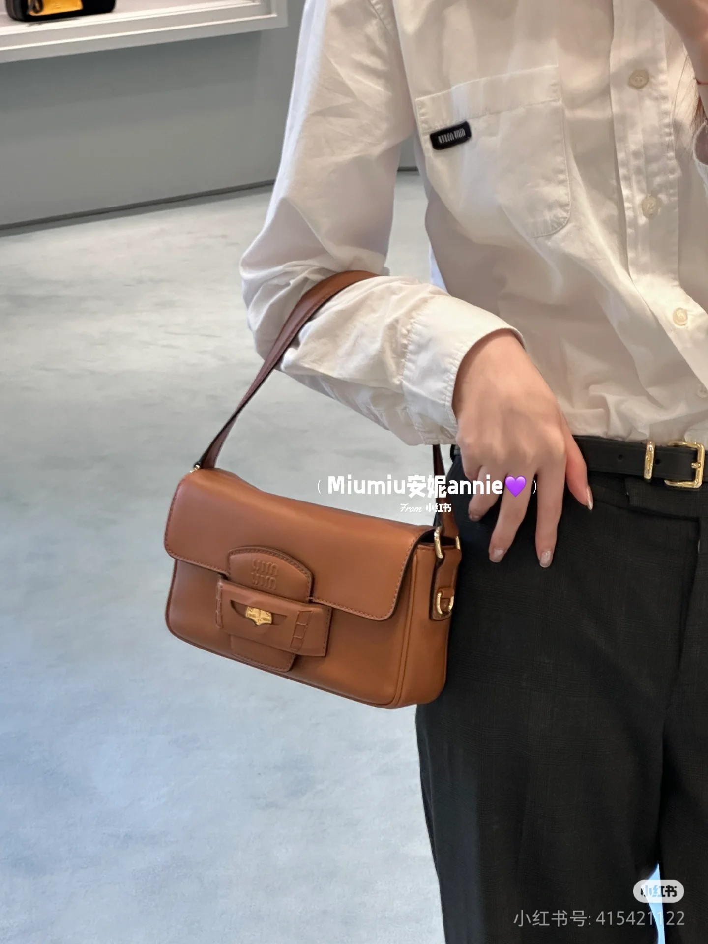 Miu Miu Gold coin bag. I moved the gold coins from my loafers to the bag. The whole bag is a fortune bag. It has a sense of design and a large ca