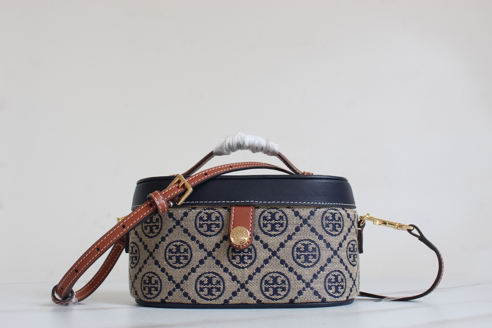 Tory Burch ～ToryBurch新款老花餐盒包 Tmonogram迷你化妆盒子包 配有可拆卸调节长肩带
