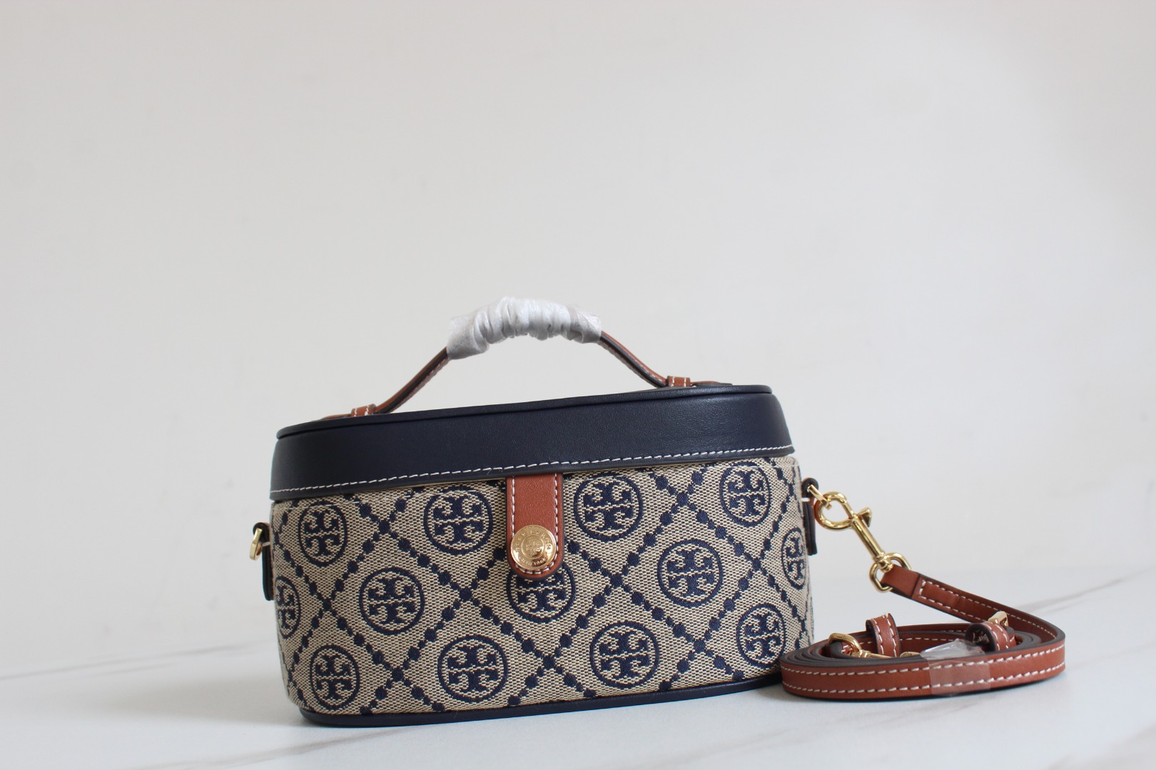 Tory Burch ～ToryBurch新款老花餐盒包 Tmonogram迷你化妆盒子包 配有可拆卸调节长肩带
