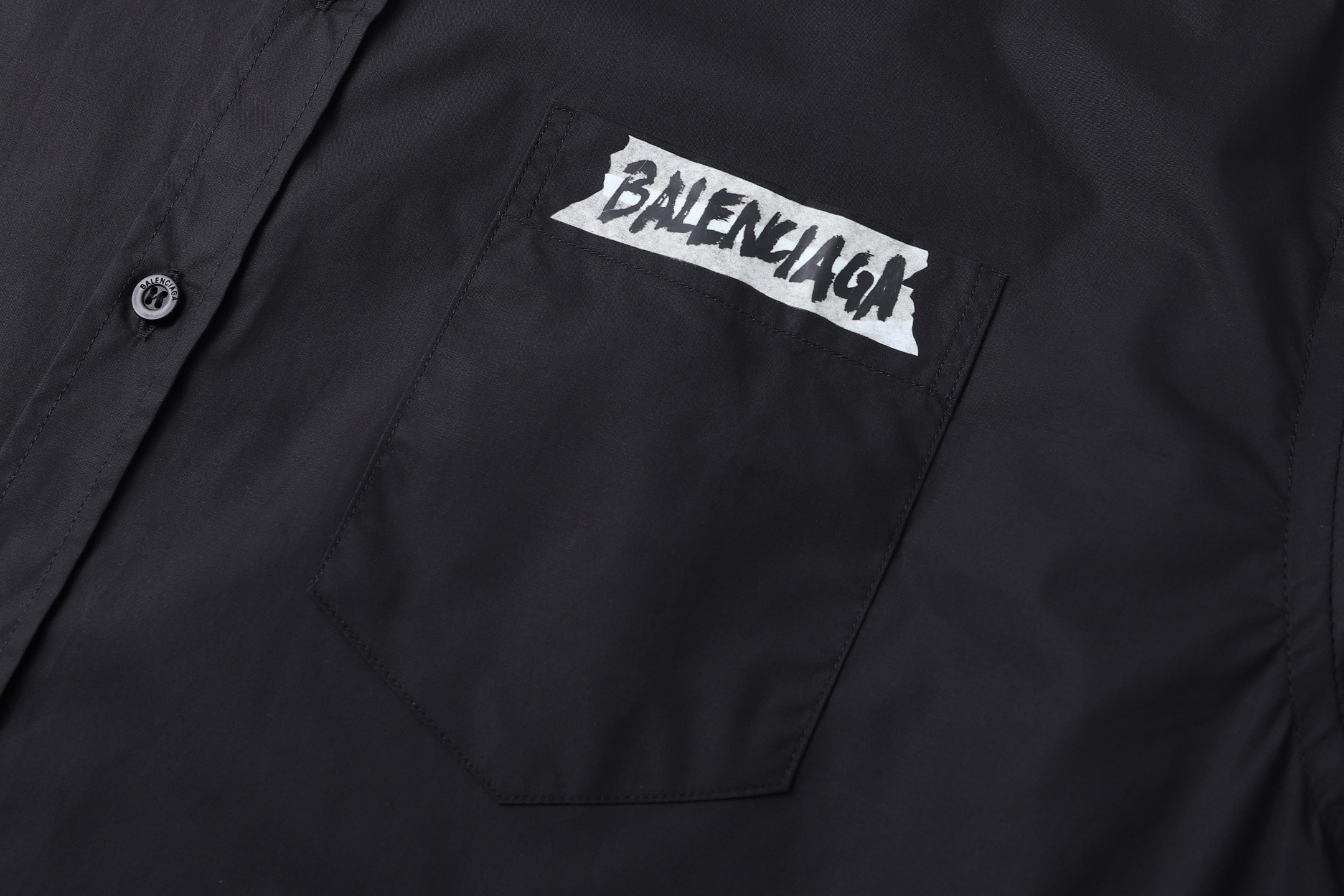 BALENCIAGA 26SS纯色翻领胶浆印花长袖衬衫 5