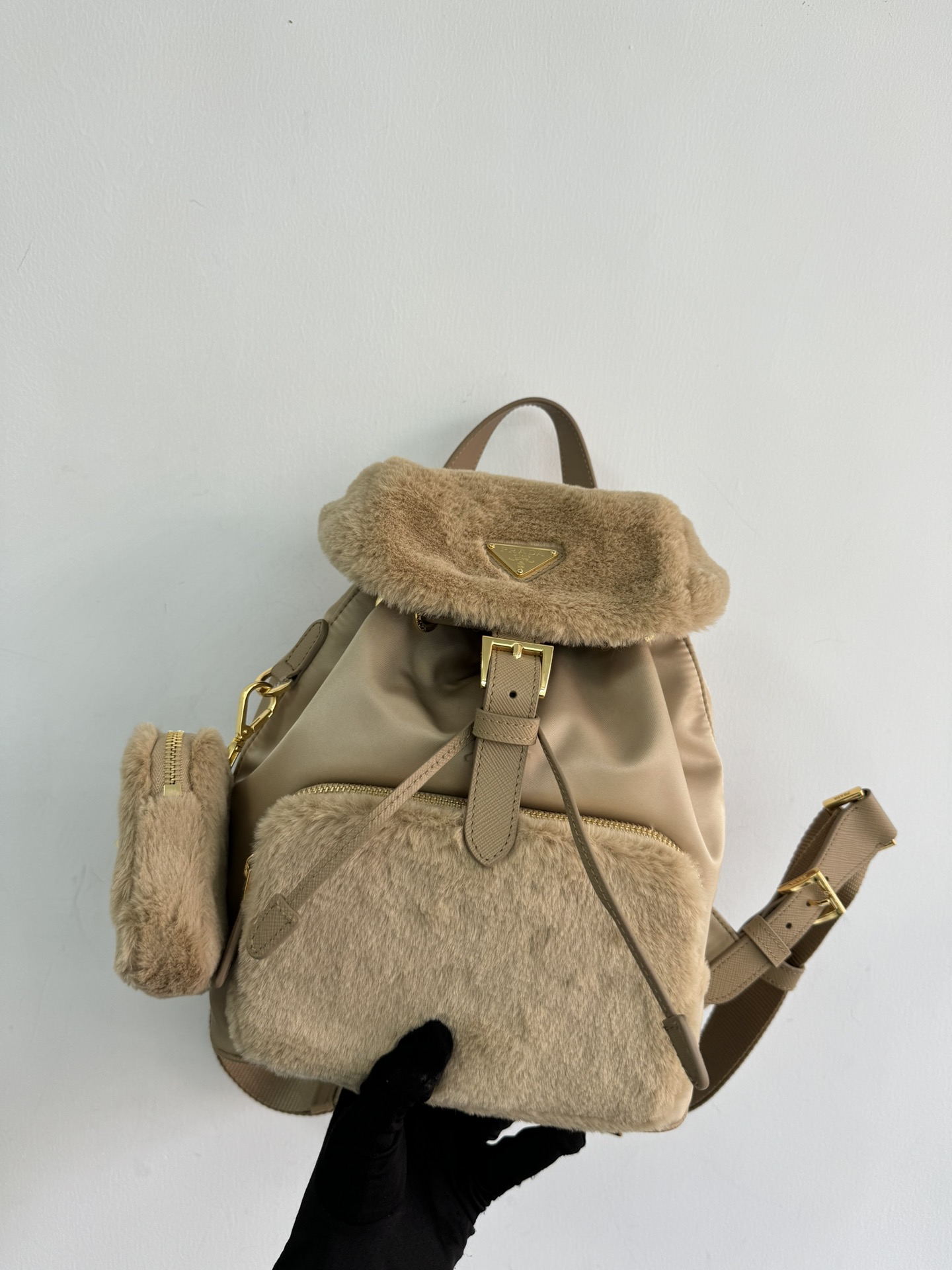 Prada's new wool backpack is officially on sale during the New Year 1BZ074. This backpack with modern design combines the practicality of innovat