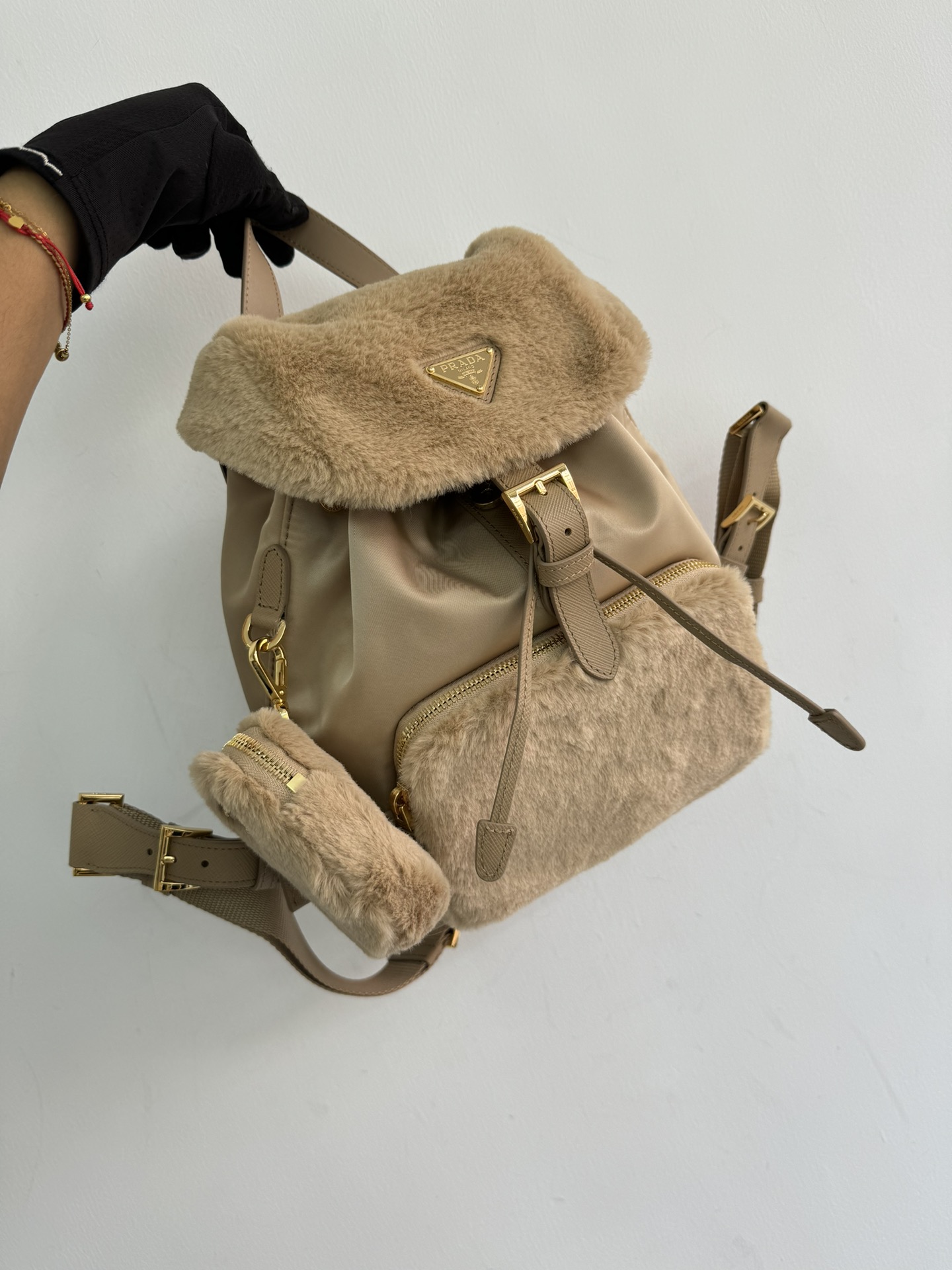 Prada's new wool backpack is officially on sale during the New Year 1BZ074. This backpack with modern design combines the practicality of innovat