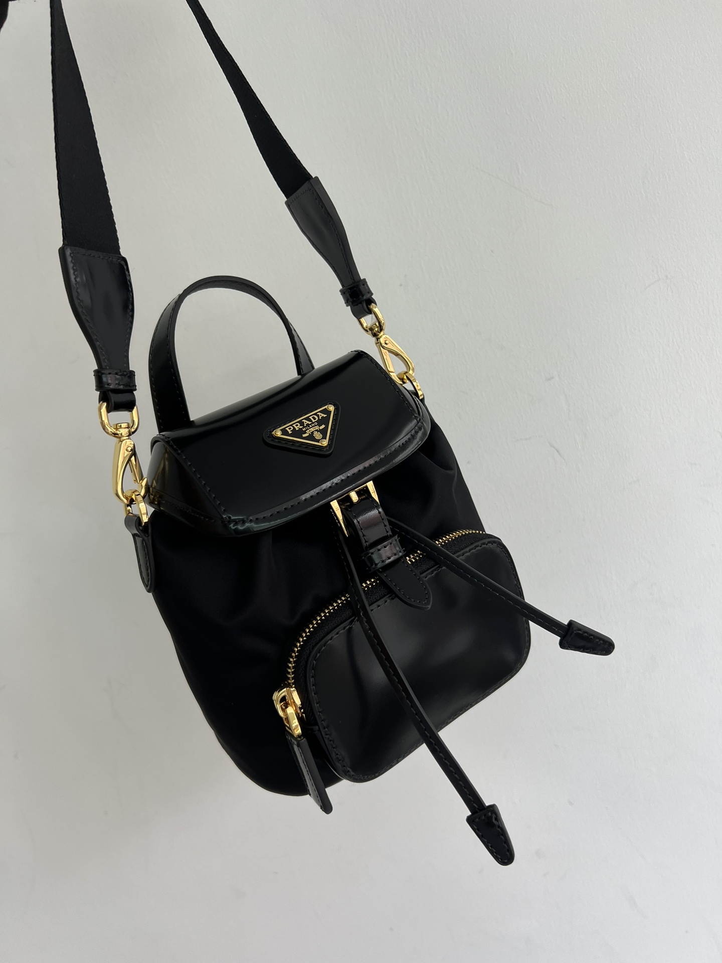 Prada's new one-shoulder mini is officially on sale 1BZ075