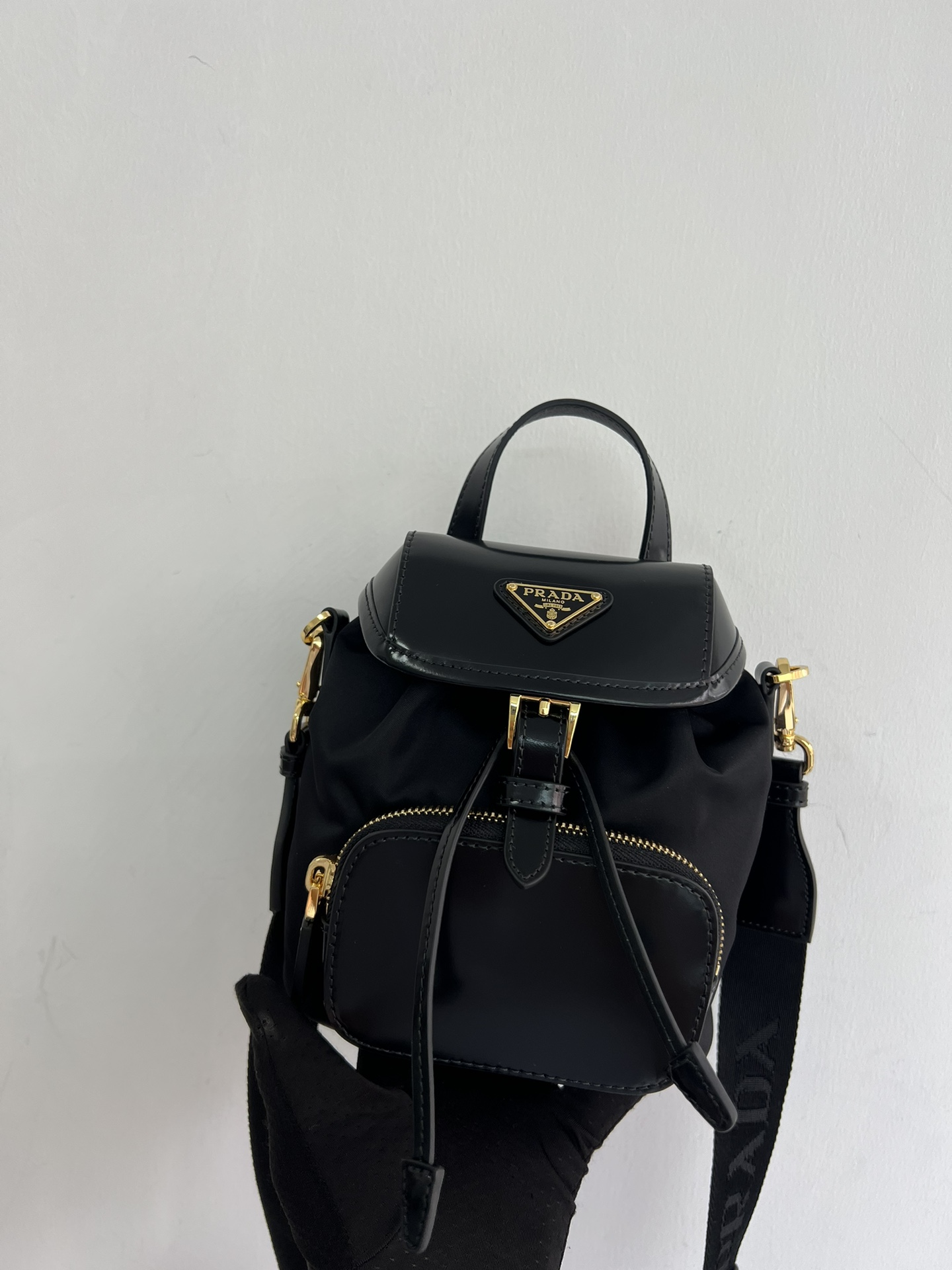 Prada's new one-shoulder mini is officially on sale 1BZ075