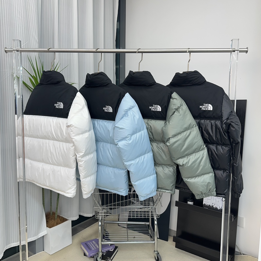 北面1996 大格子袖标羽绒服