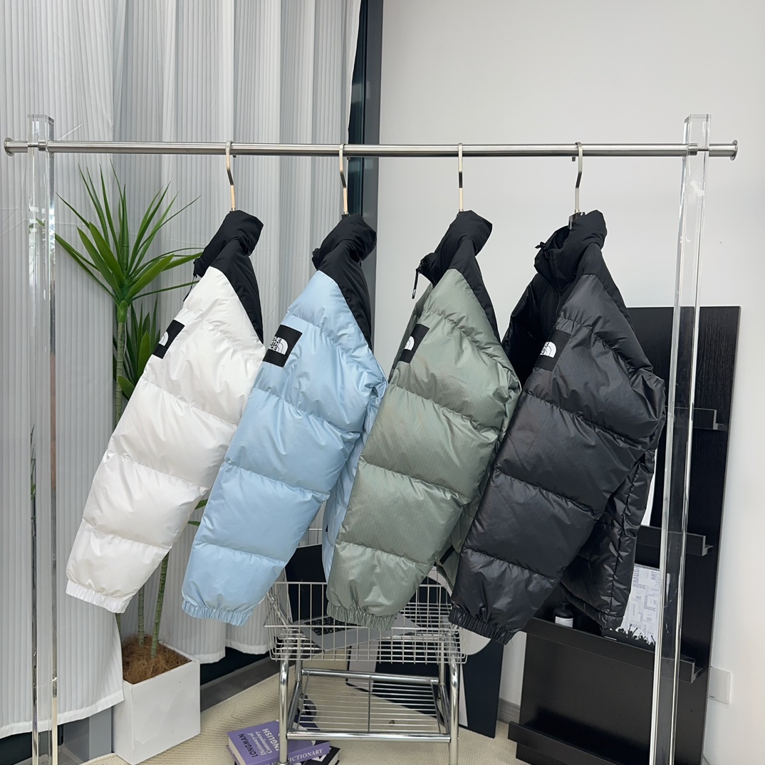 北面1996 大格子袖标羽绒服