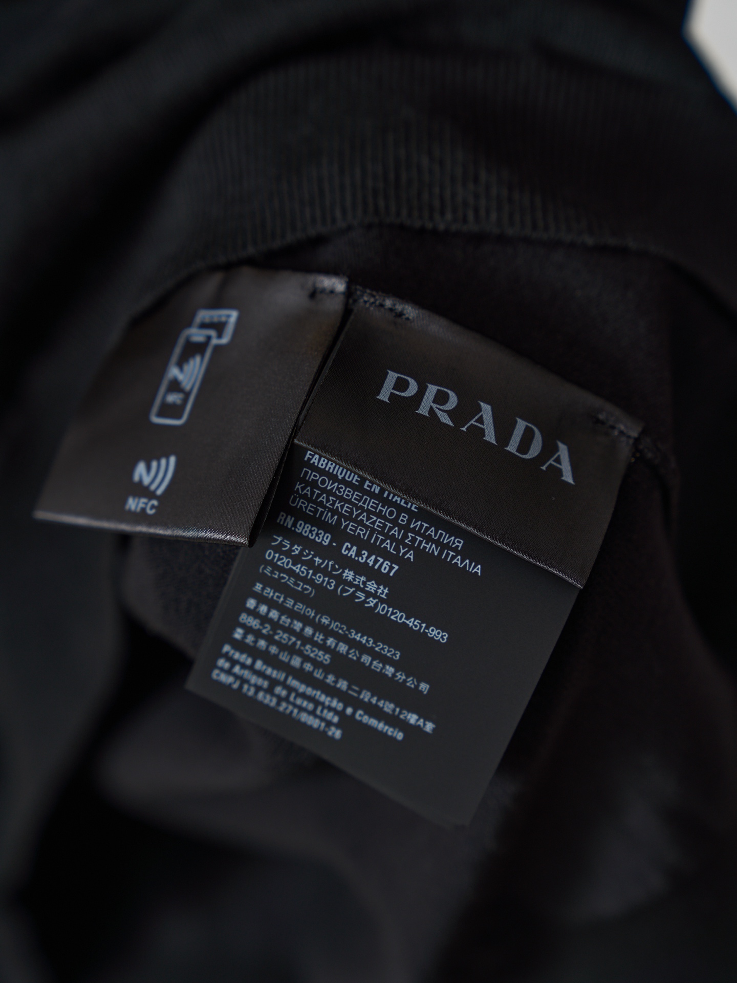 Prada 三角徽标半拉链短袖毛衣polo衫