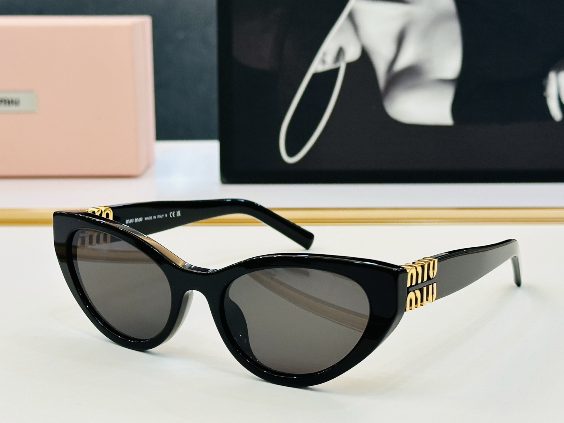 Miu Miu SMUA04SF Cat Eye Sunglasses, Stylish Black Frame, UV Protection