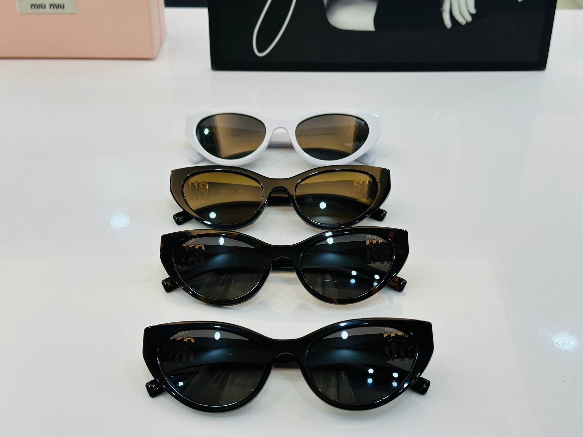 Miu Miu SMUA04SF Cat Eye Sunglasses, Stylish Black Frame, UV Protection 10 i1749123000217 4928 0 8