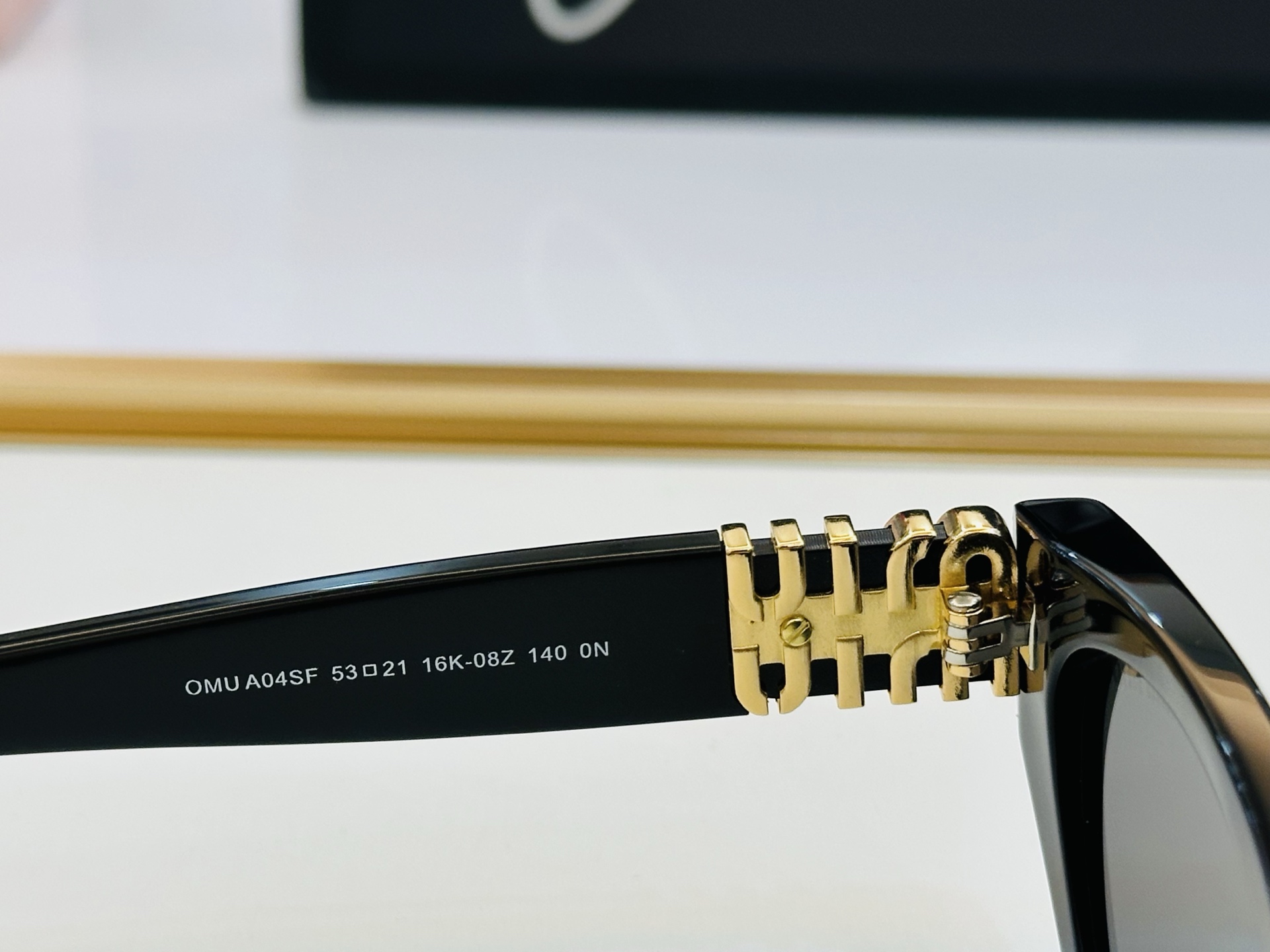 Miu Miu SMUA04SF Cat Eye Sunglasses, Stylish Black Frame, UV Protection 9 i1749123000226 2792 0 7