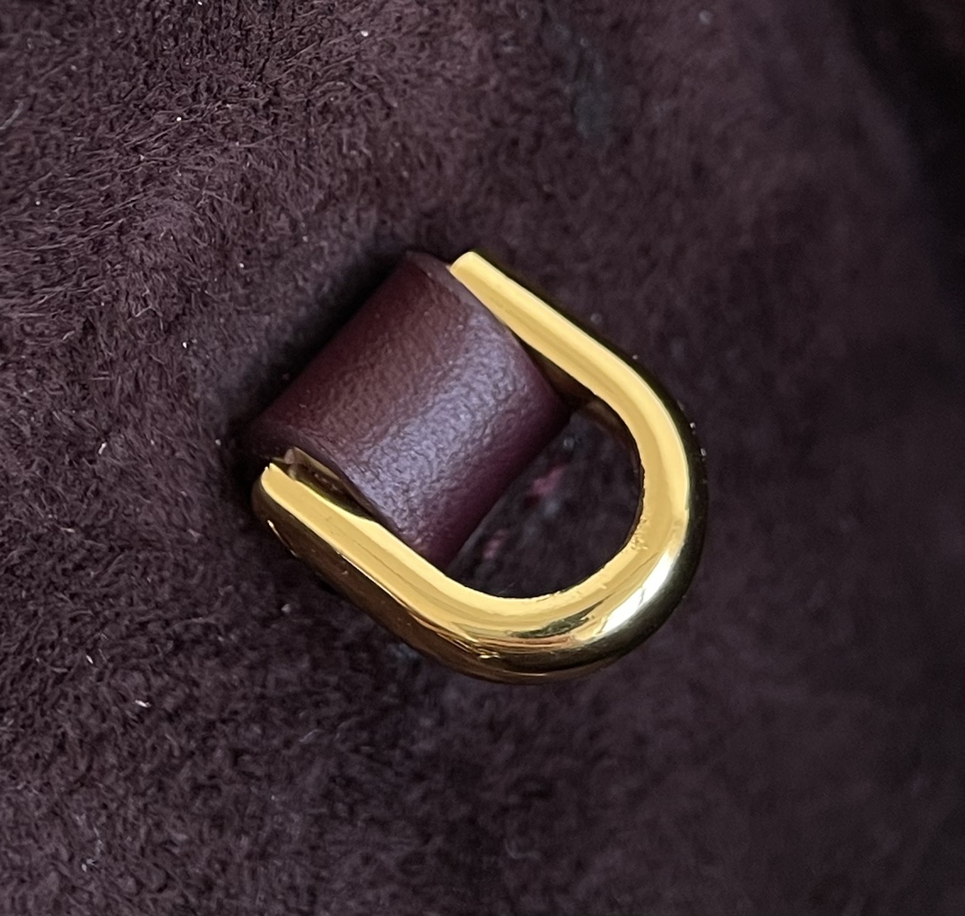 Burberry The hardware is all the same general aged hardware.