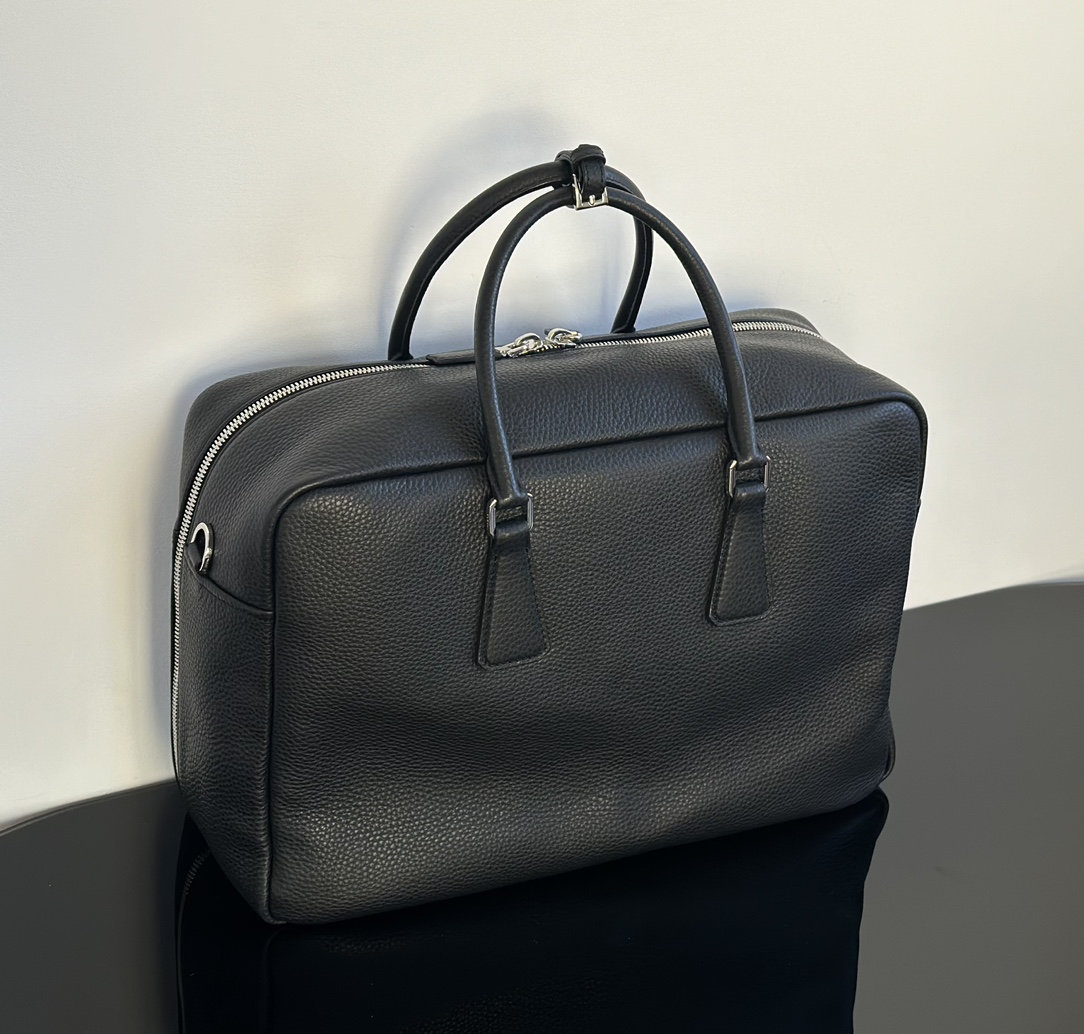 Real shots of Pradas 24 thick pebbled briefcases,