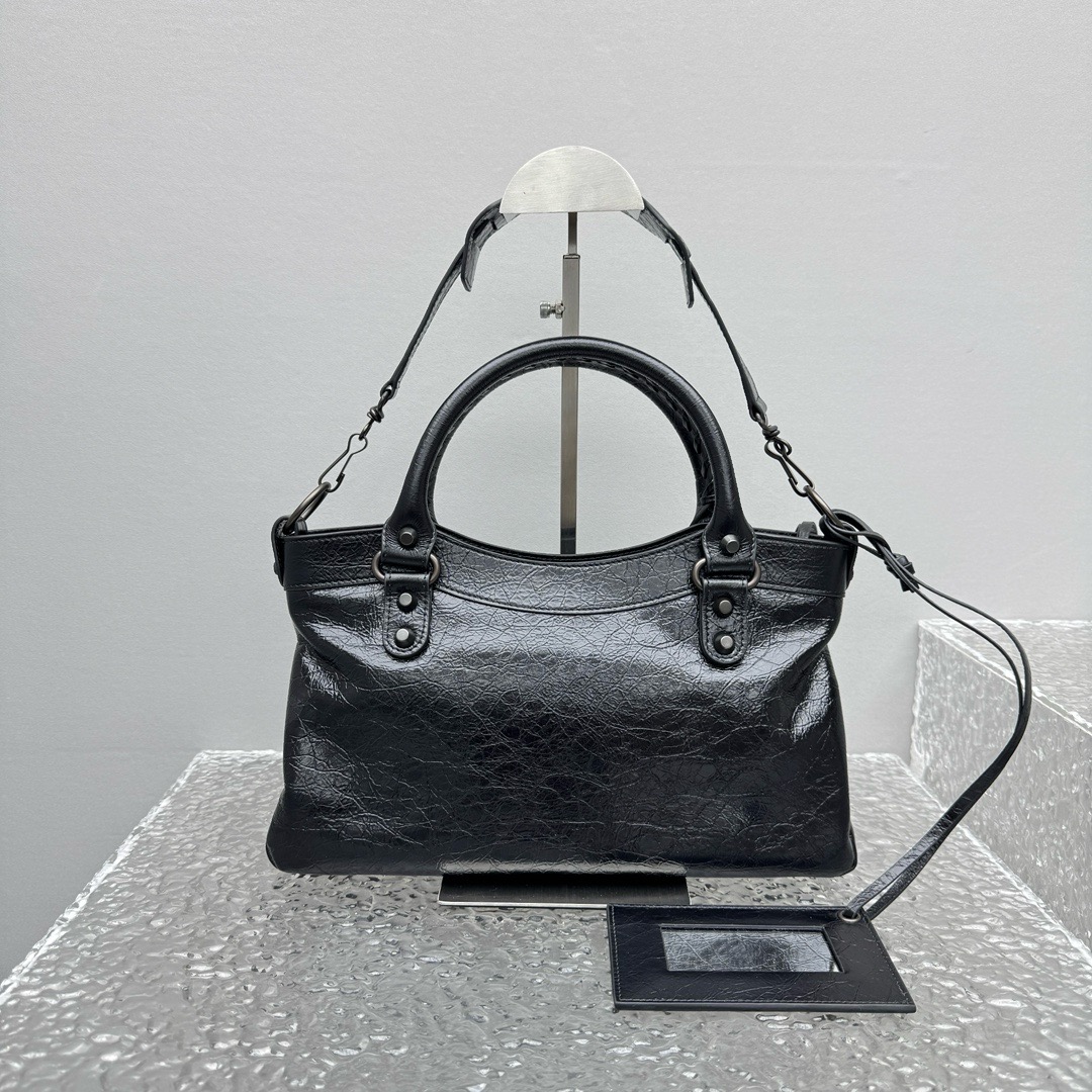 Balenciaga Style Black Top Handle Bag style reference detail image 4 from source 776279