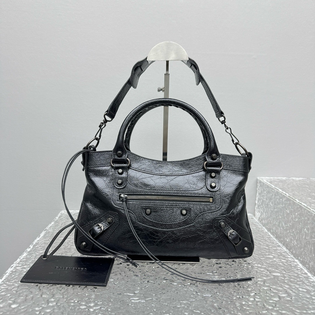 Balenciaga Style Black Top Handle Bag style reference detail image 2 from source 776279