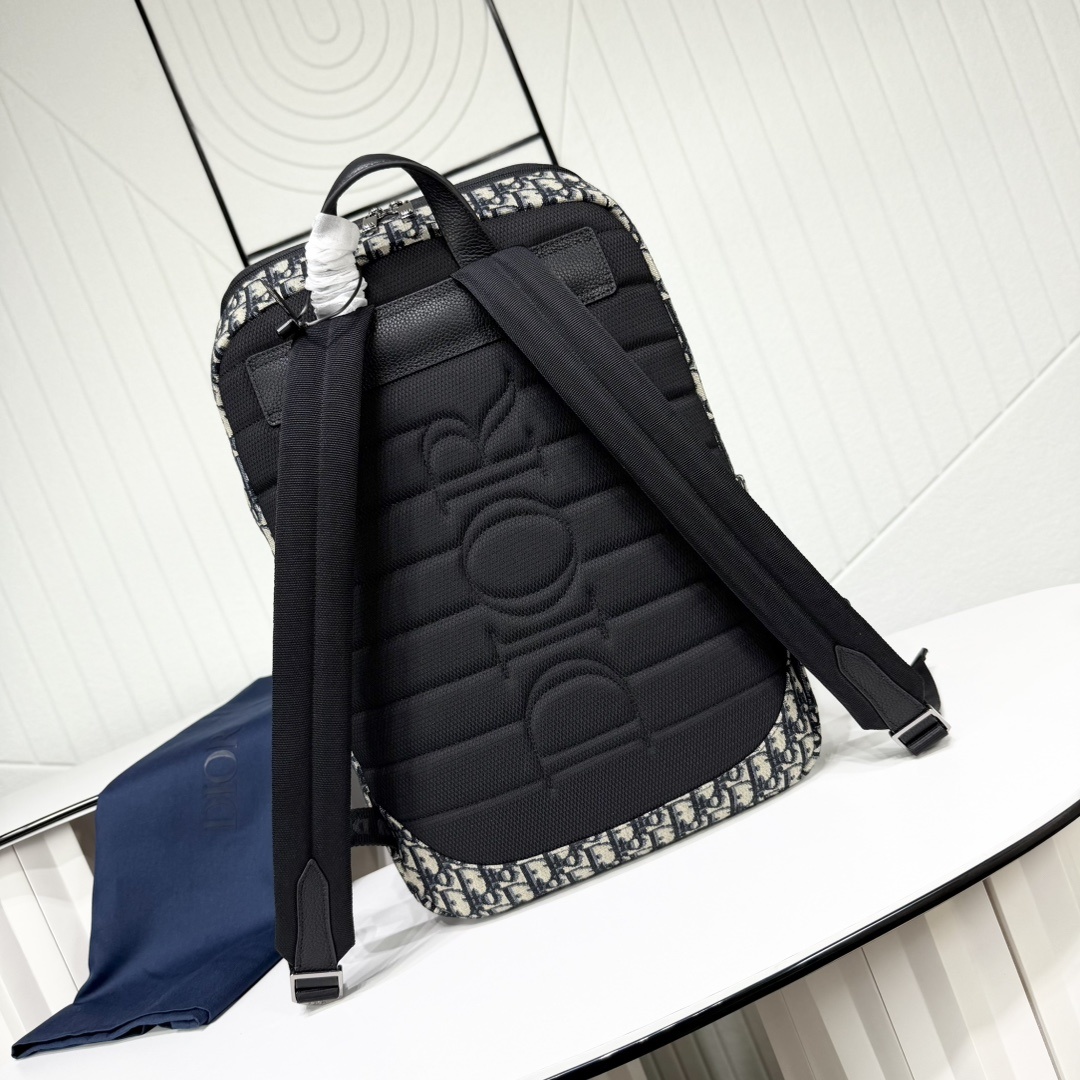 Rider Soft 拉链双肩背包米色和黑色 Oblique 印花面料搭配黑色粒面牛皮革编号: 1ESB