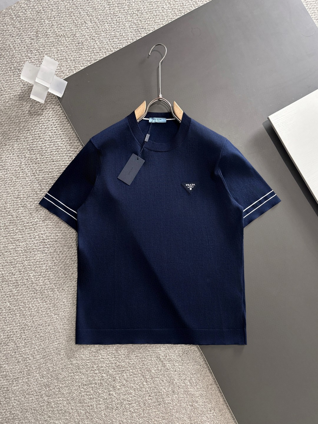Prada Men's Navy Blue T-Shirt with White Striped Sleeves - Casual & Luxury 1 a1752309155247 1674