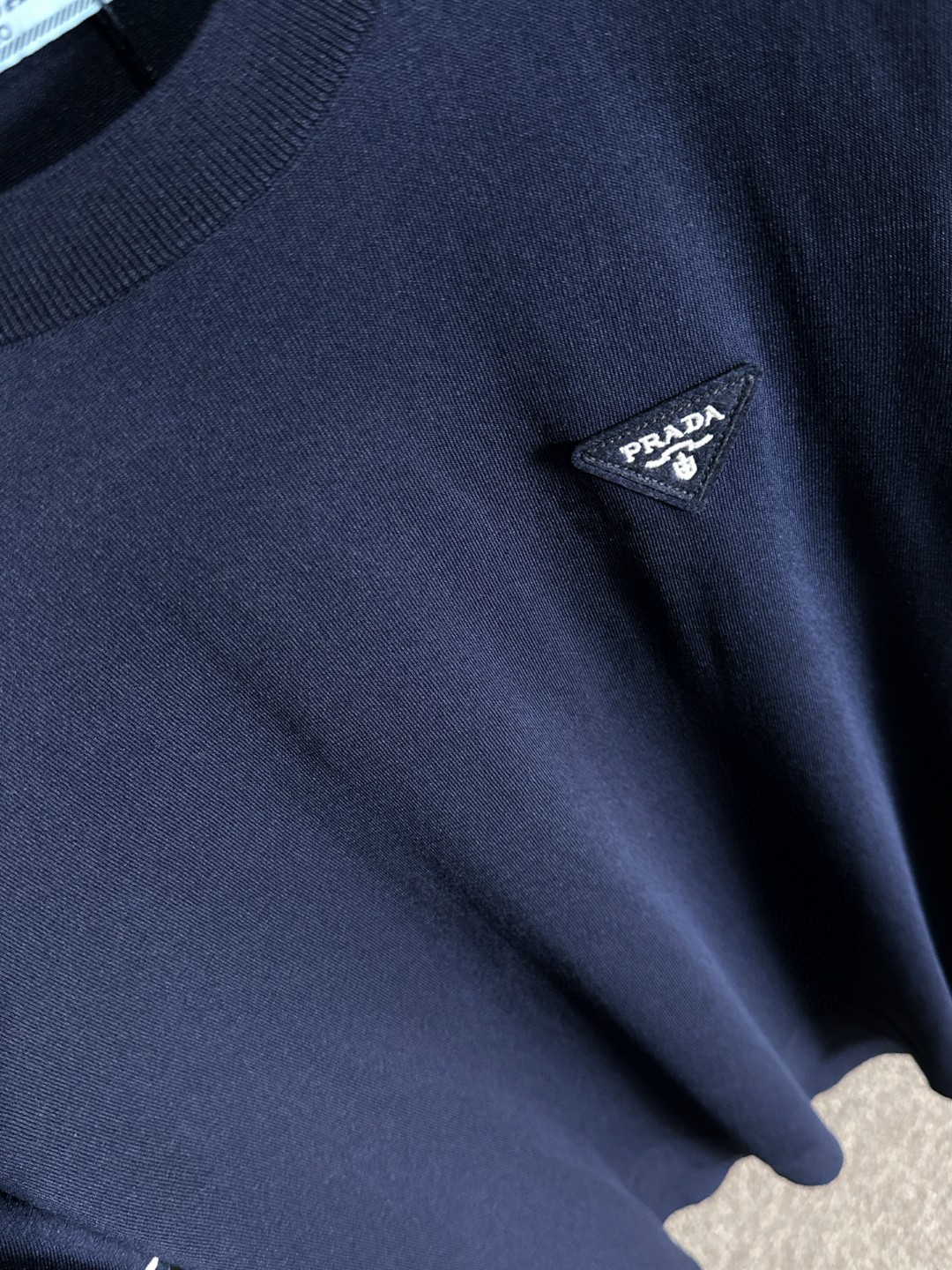 Prada Men's Navy Blue T-Shirt with White Striped Sleeves - Casual & Luxury 8 a1752309156408 1166