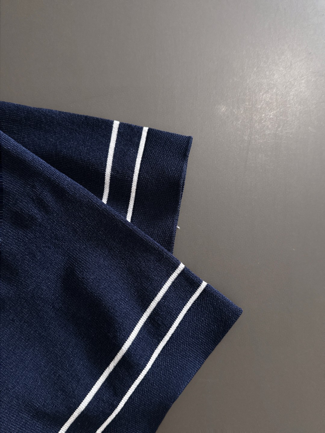 Prada Men's Navy Blue T-Shirt with White Striped Sleeves - Casual & Luxury 6 a1752309156427 8050