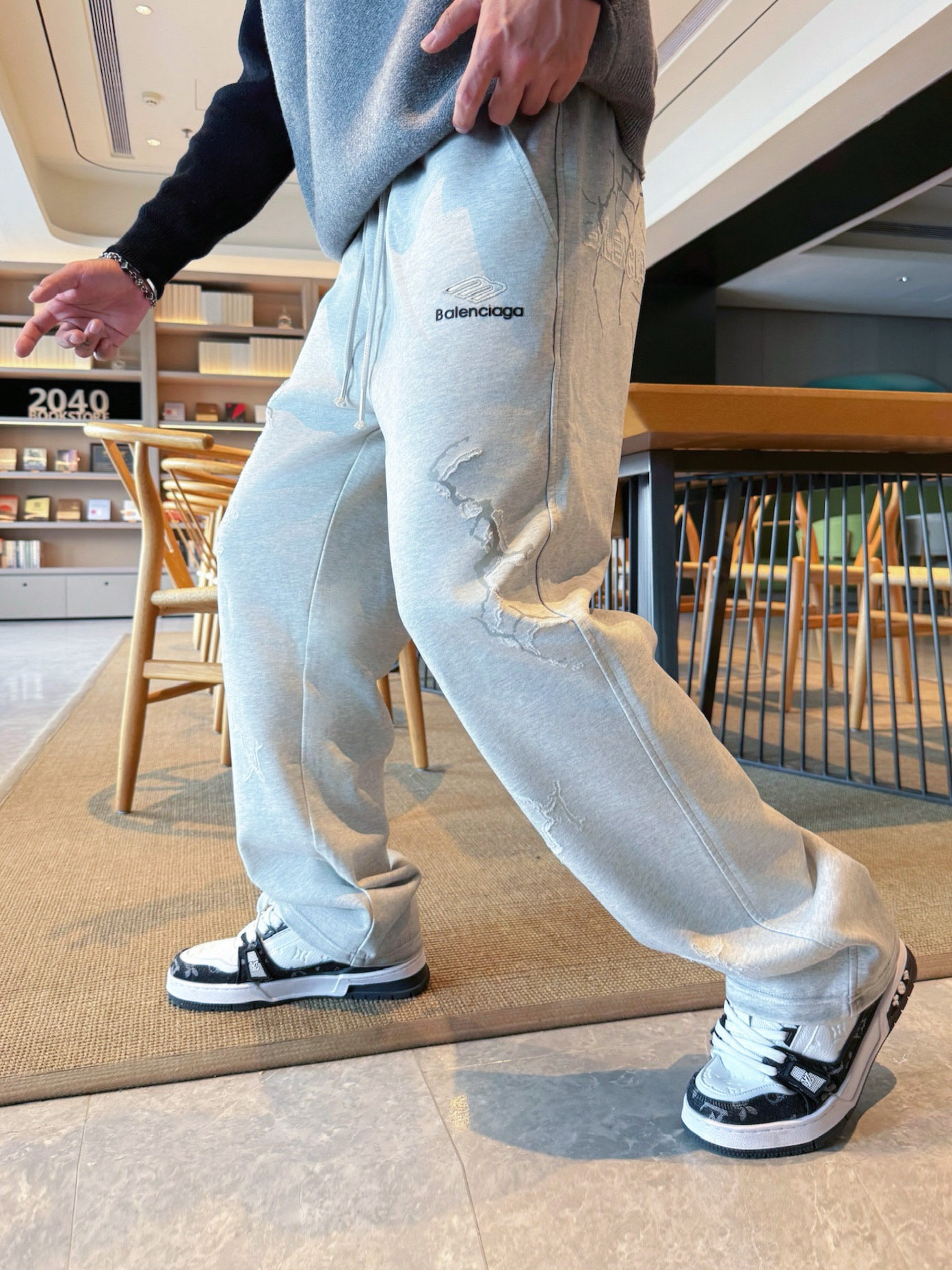 Balenciaga Distressed Logo Print Sweatpants | Comfortable & Stylish