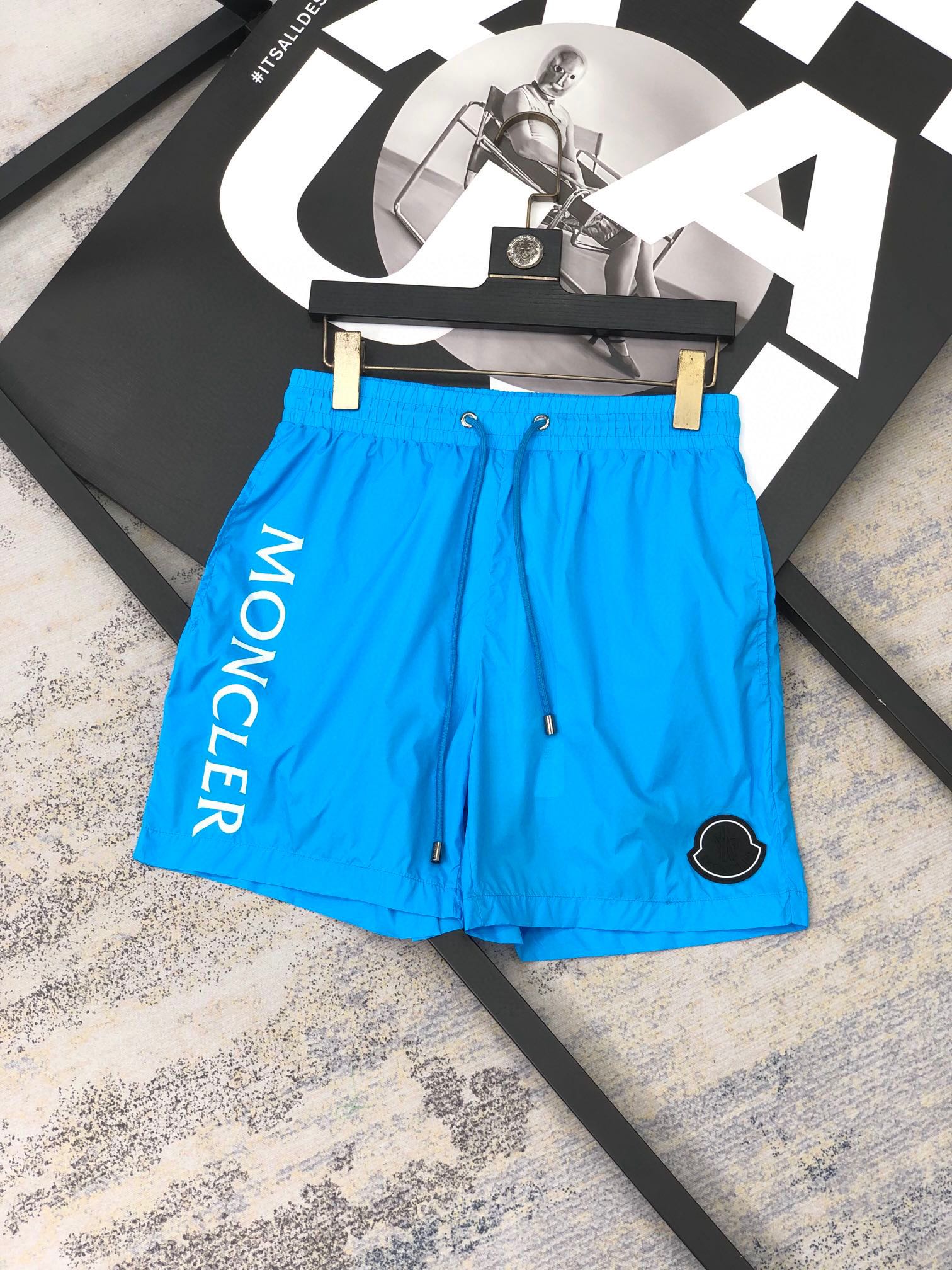 MONCLER Men's Blue Swim Trunks - Stylish Summer Essential