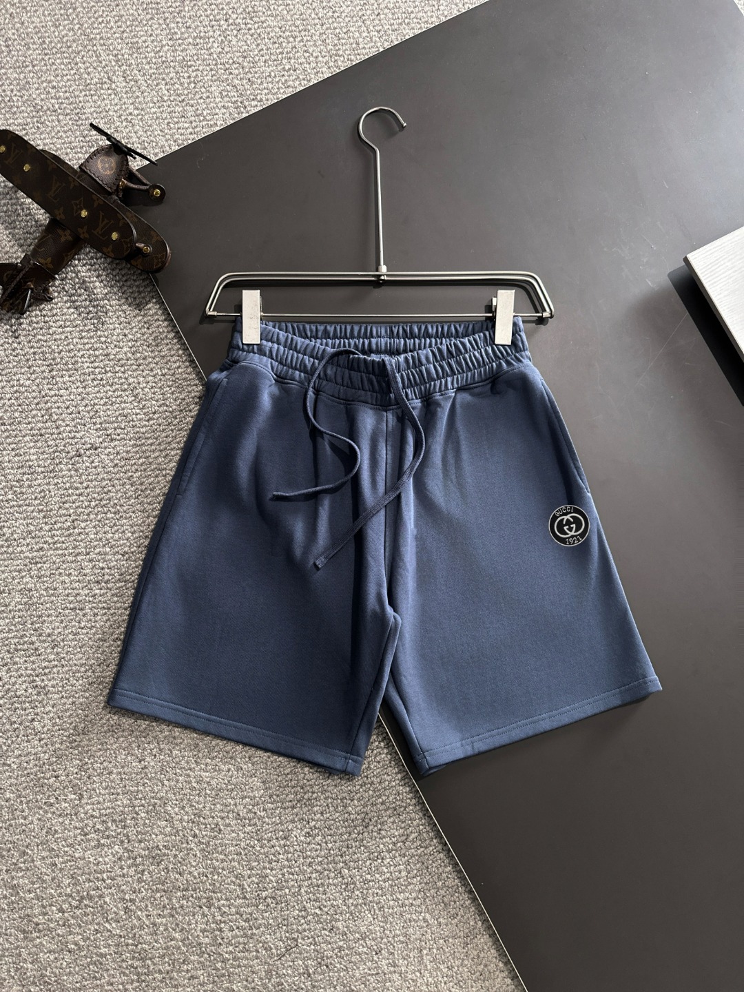 Envío al día siguiente P alta calidad GUCCI/Gucci 2025 nueva colección de primavera/verano pantalones cortos holgados d…