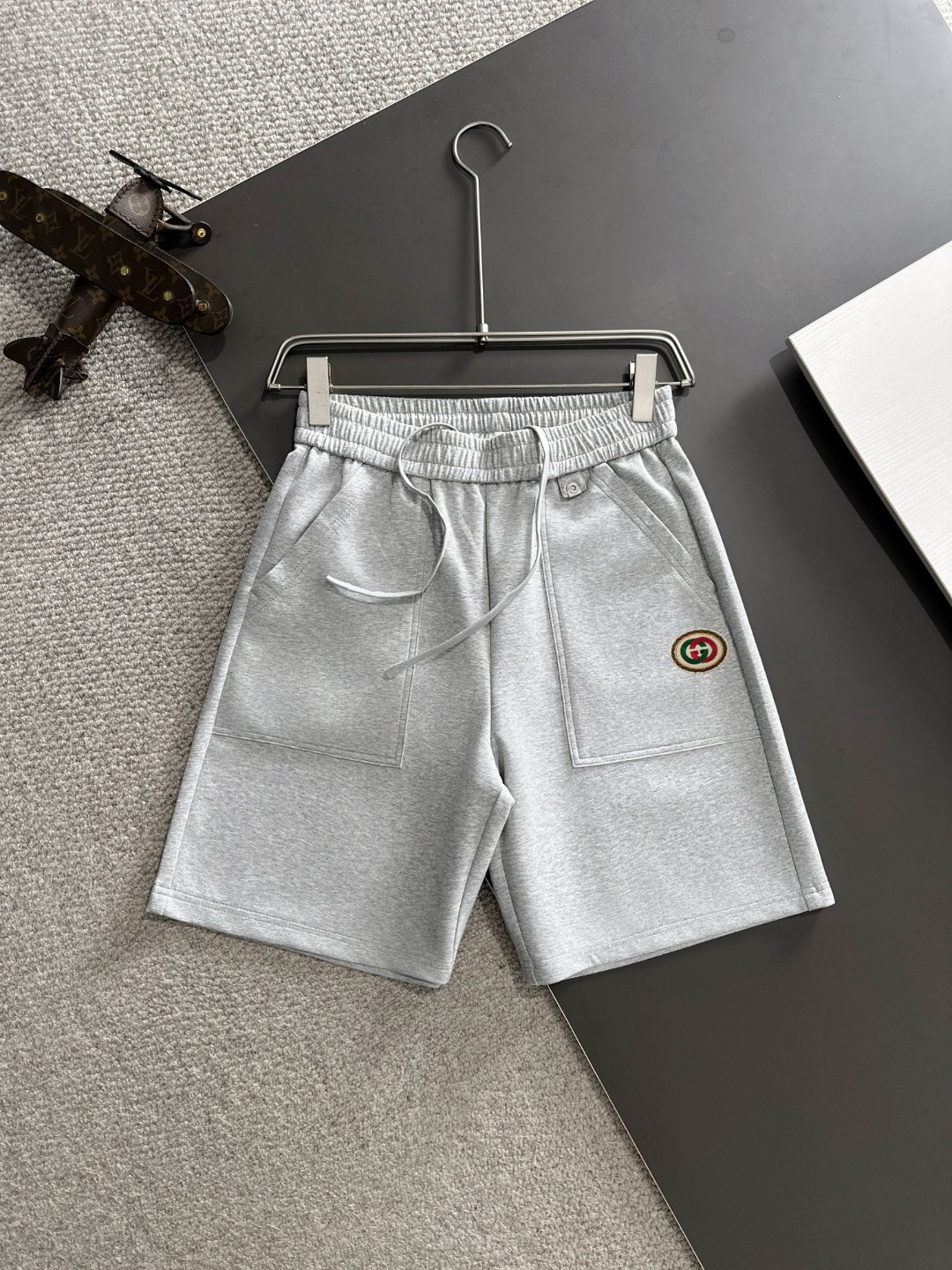 Envío al día siguiente Alta calidad GUCCI/Gucci 2025 nueva colección de primavera/verano pantalones cortos holgados de …