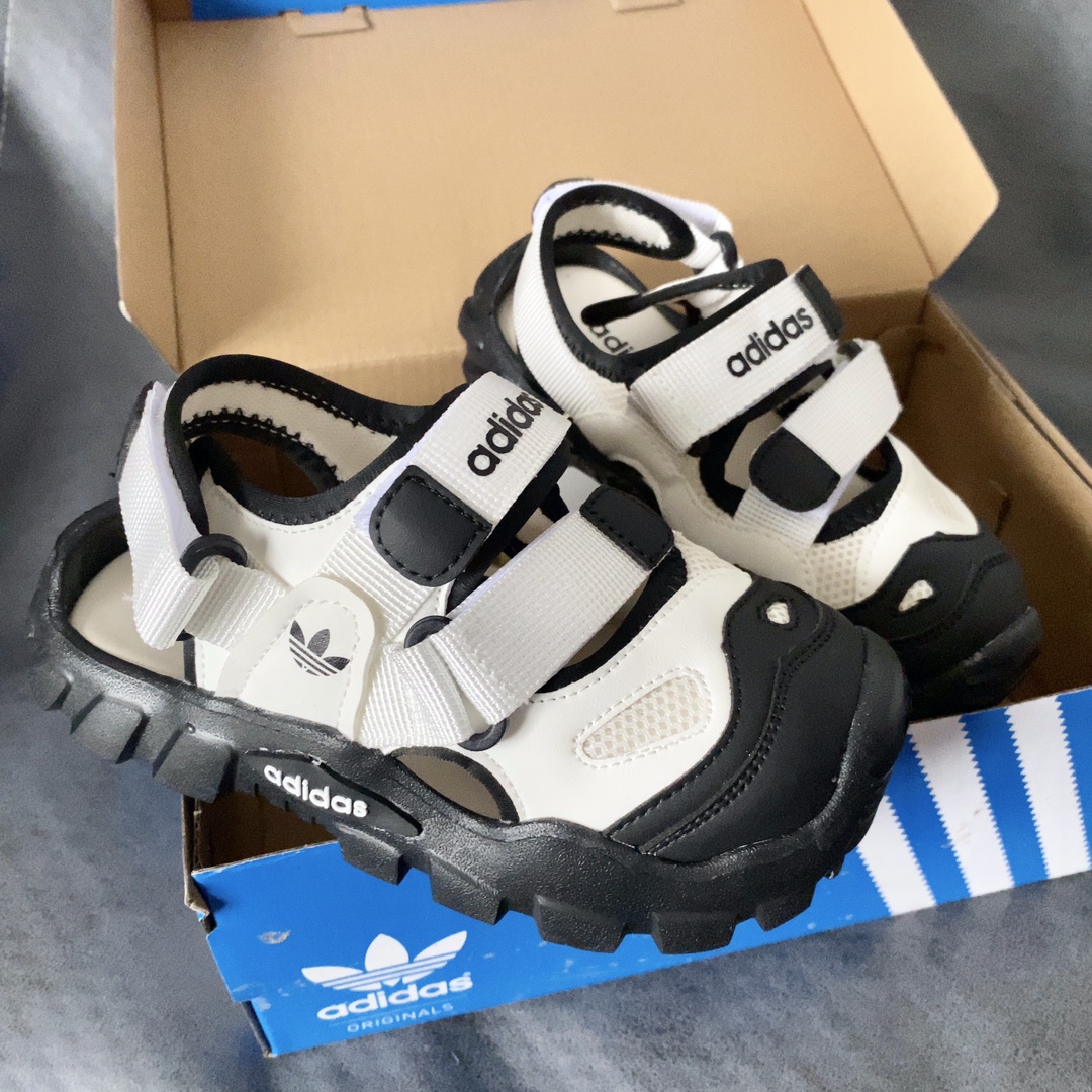 AD儿童海螺沙滩凉鞋 透气包头防踢 魔术贴穿脱便捷为一体鞋面设计 防滑耐折耐磨 柔软有韧性，特别设计的鞋头自然上翘15度贴合孩子走路习惯 防止摔跤的高级EVA鞋底-选品中心