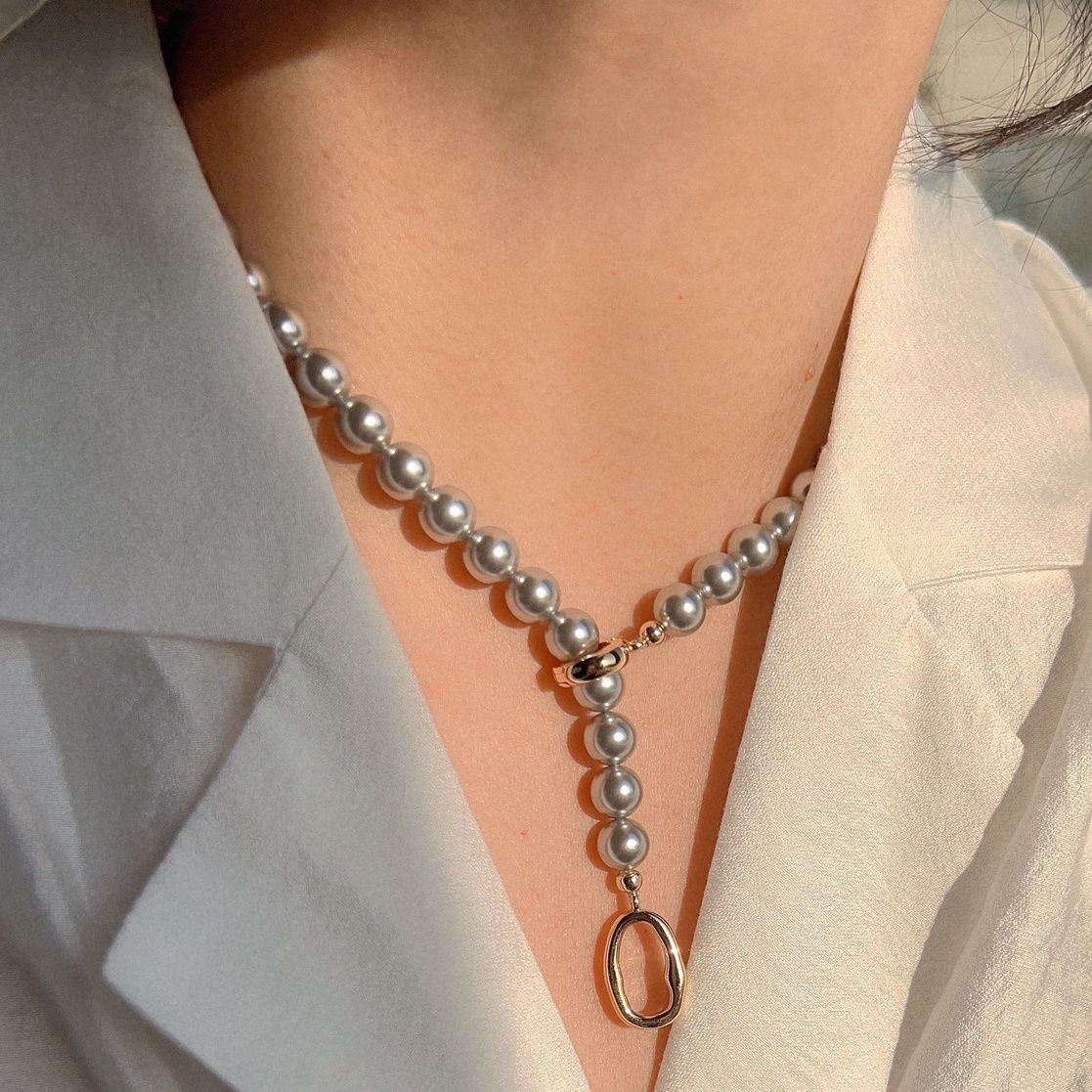 allowing the necklace to be worn in two different configurations - Jewelry
