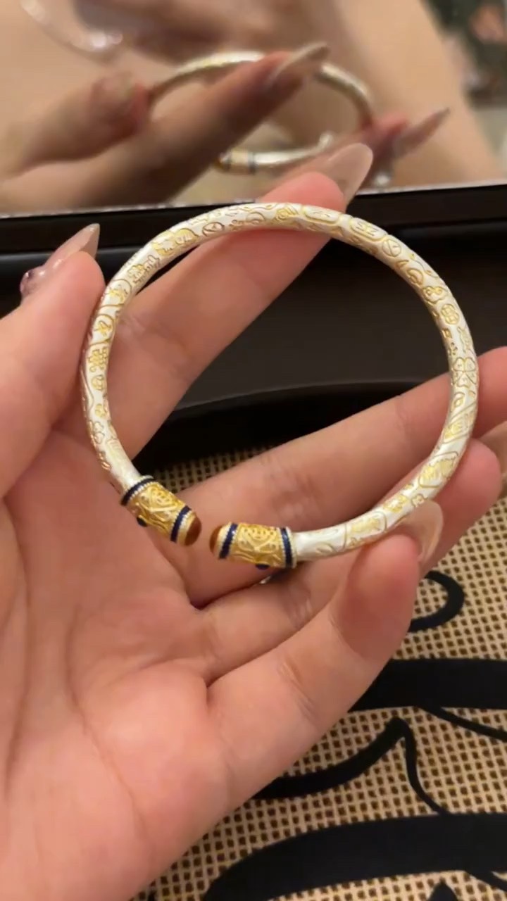paired in a stack with an enamel-accented silver bracelet - Jewelry