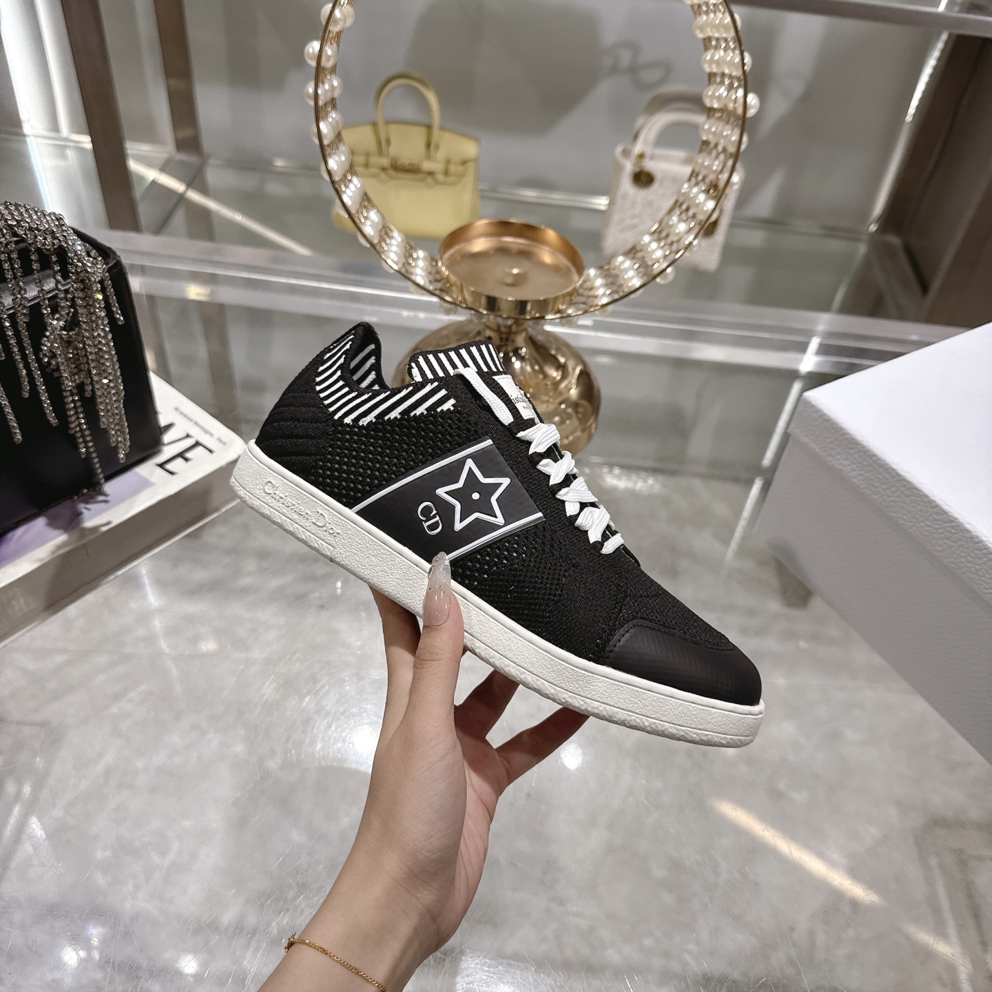 Dior Star Sneakers: Black Knit, Suede Accents, Iconic Star Detail 1 Dior Star Sneakers: Black Knit, Suede Accents, Iconic Star Detail