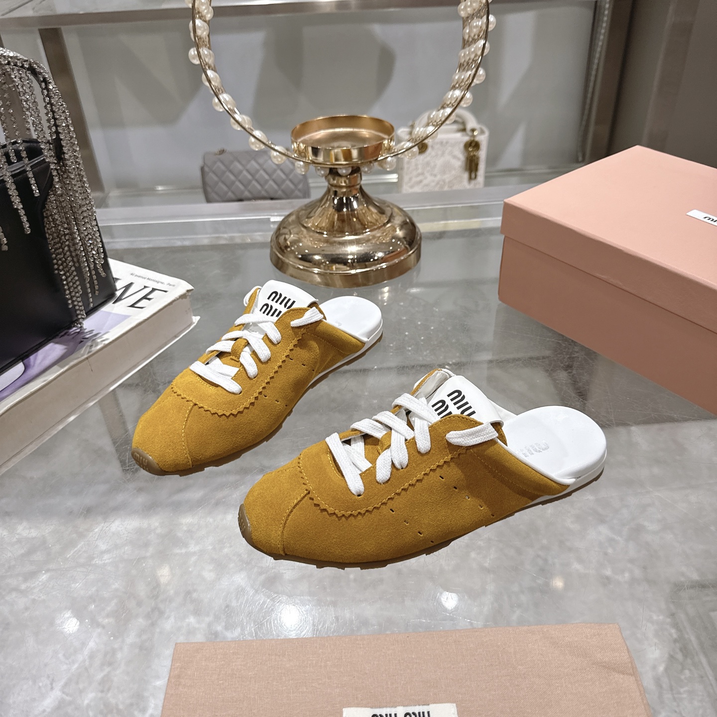 Miu Miu 25SS Leather Mules with Adjustable Straps and Rubber Sole 2 i1746688036925 7820 0 2